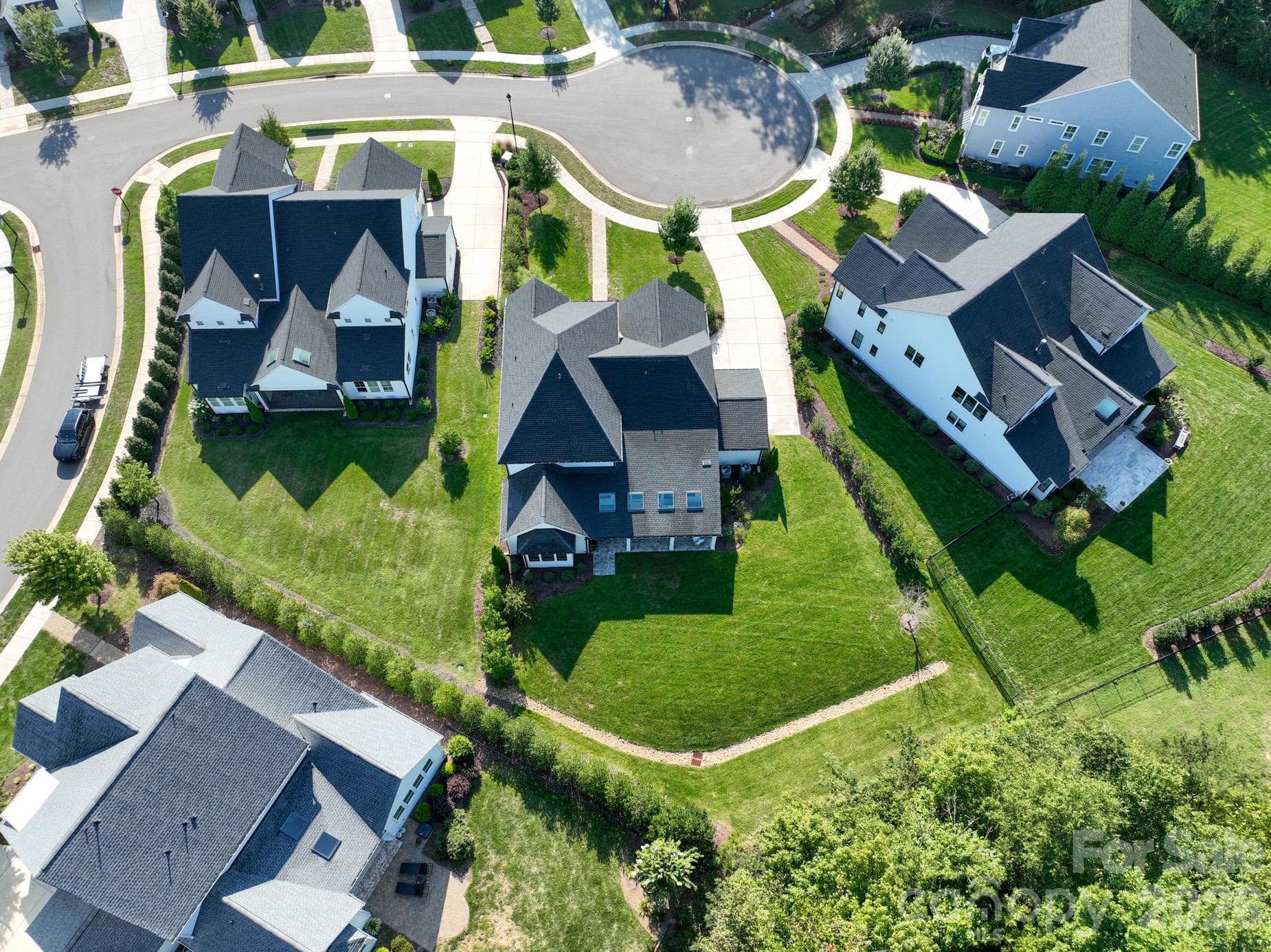 Aerial view of Tree lined back yard and privacy - 9588 Pacing Lane NW, Concord