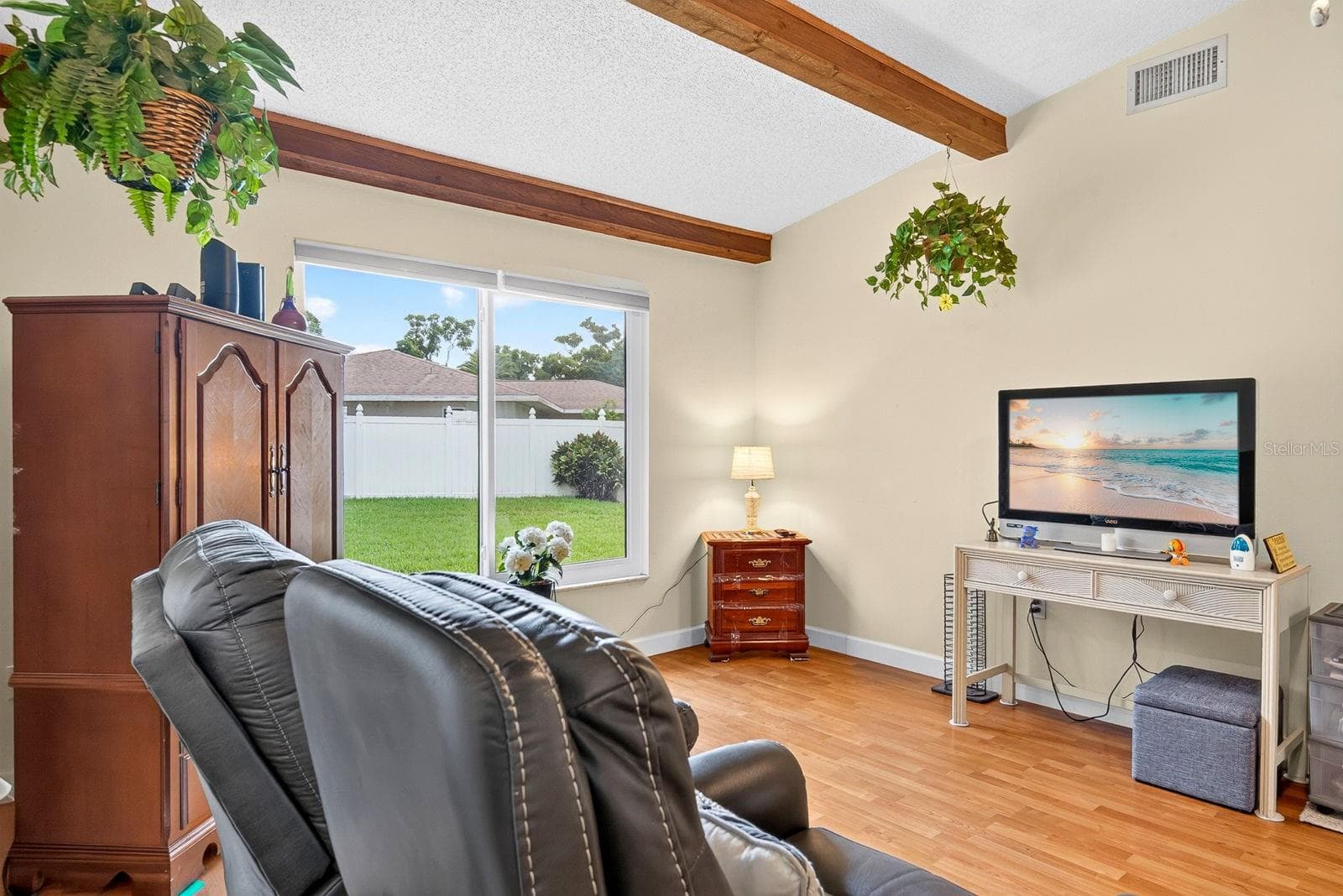 Family room with large window into yard - 6806 21ST AVENUE TER W, BRADENTON