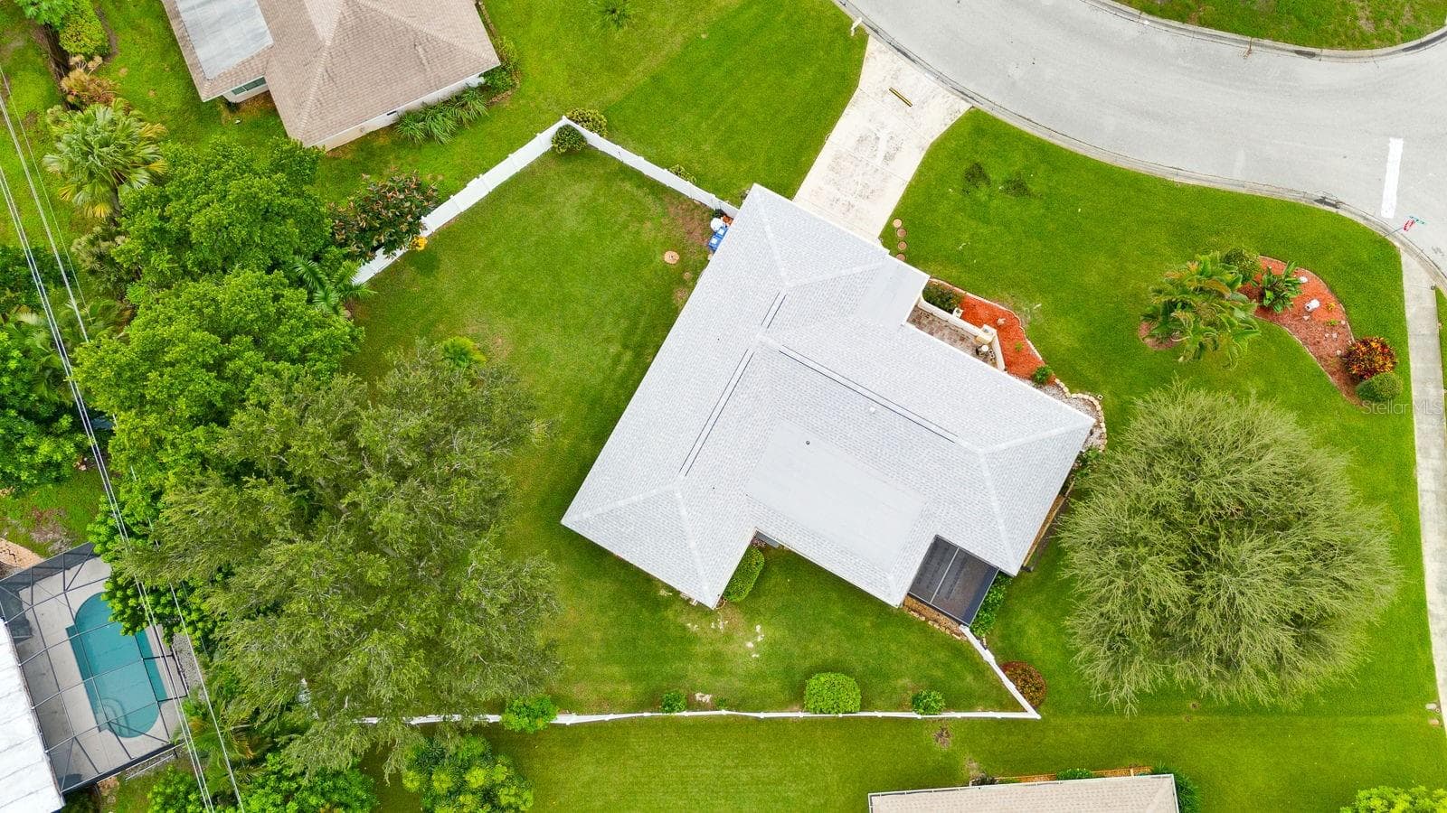 Aerial view over the home and yard - 6806 21ST AVENUE TER W, BRADENTON