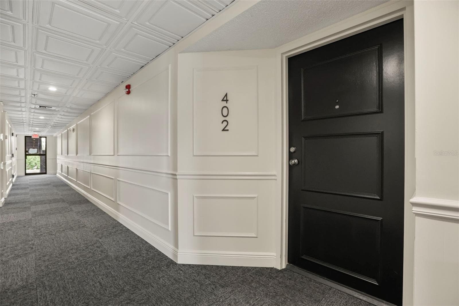 Situated on the top floor and convenient to the elevator, this charming Winter Park condo offers beautiful Winter Park views in a quiet setting. - 300 CAROLINA AVE #402C, WINTER PARK