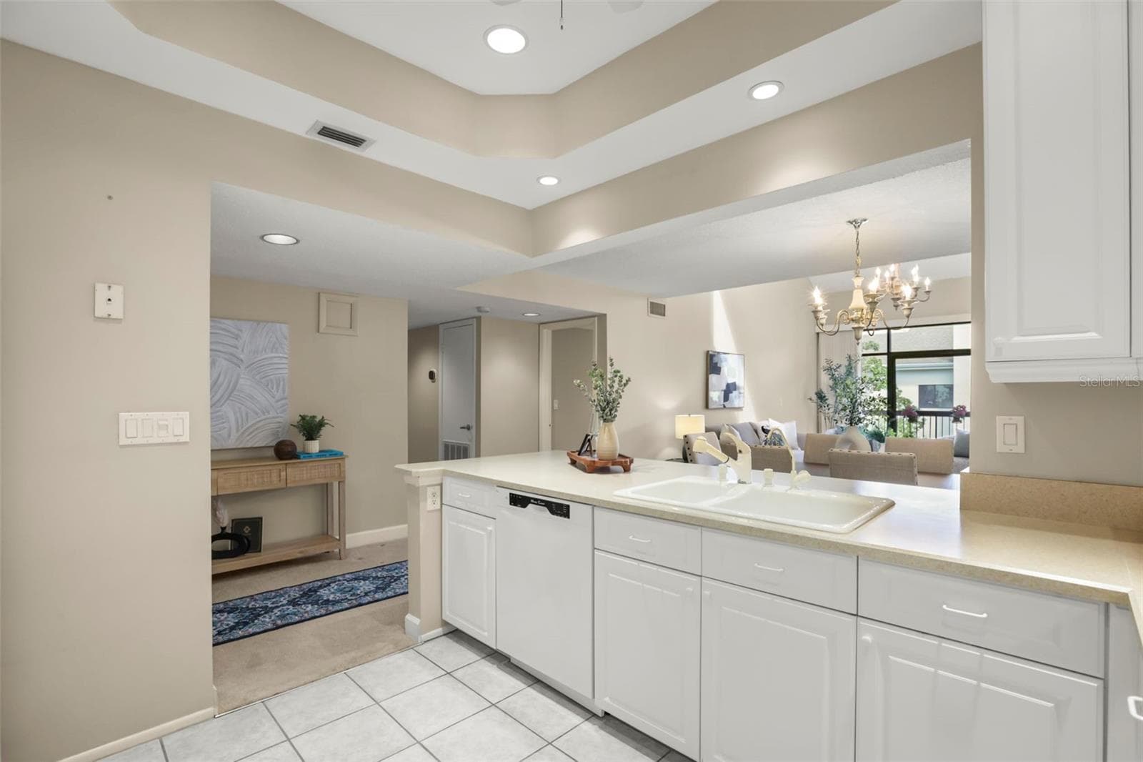 Like so many homeowners desire, this kitchen is open to living areas to create an inviting flow. - 300 CAROLINA AVE #402C, WINTER PARK