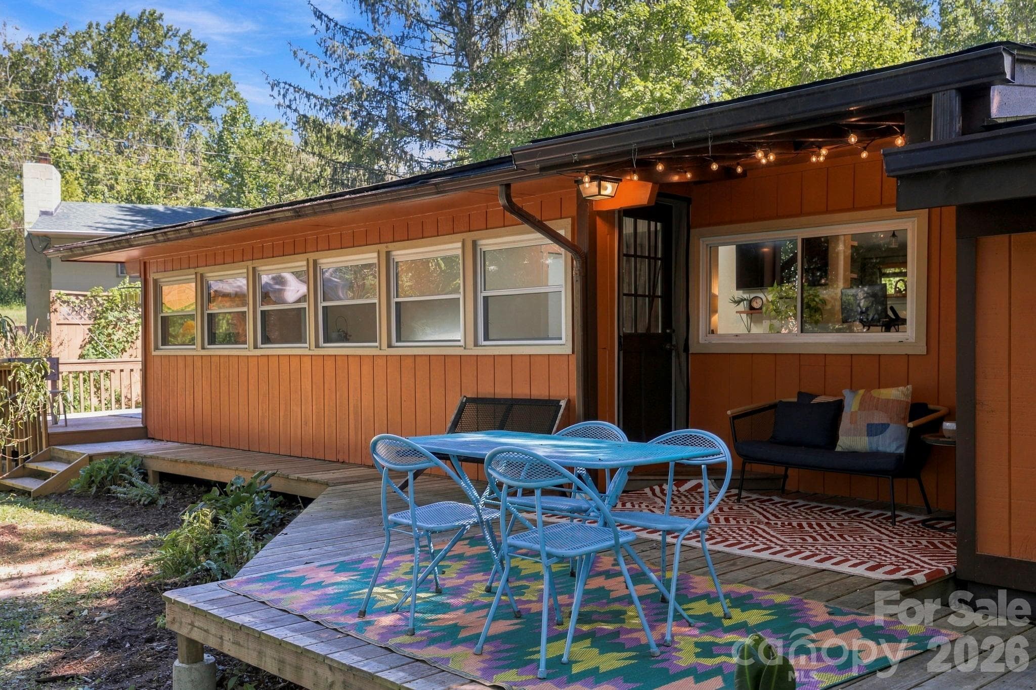 Multiple hang out spaces on deck - 16 Melton Drive, Asheville
