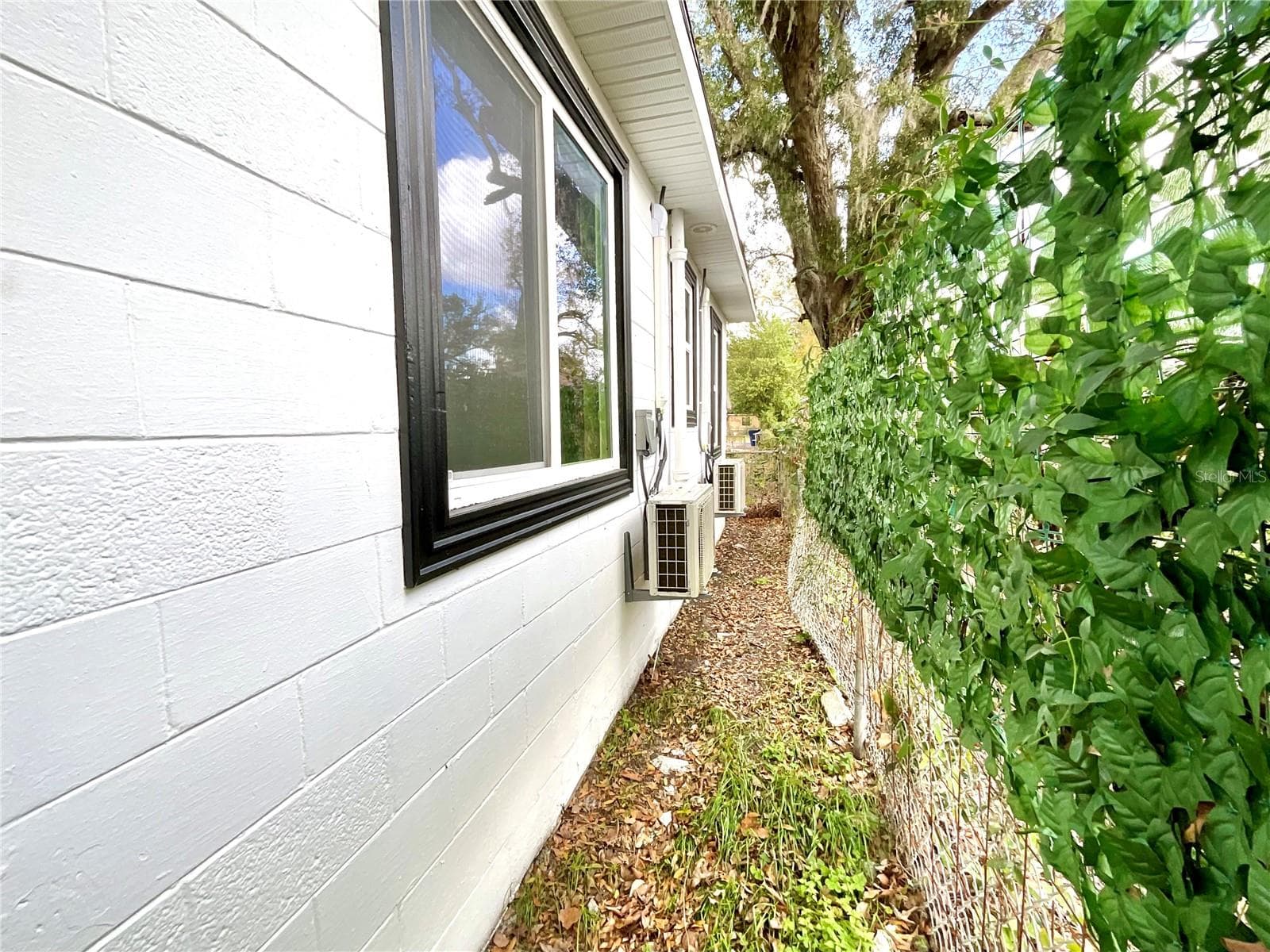 Original Exterior Side_AC Splitter - 2102 E CARACAS ST, TAMPA