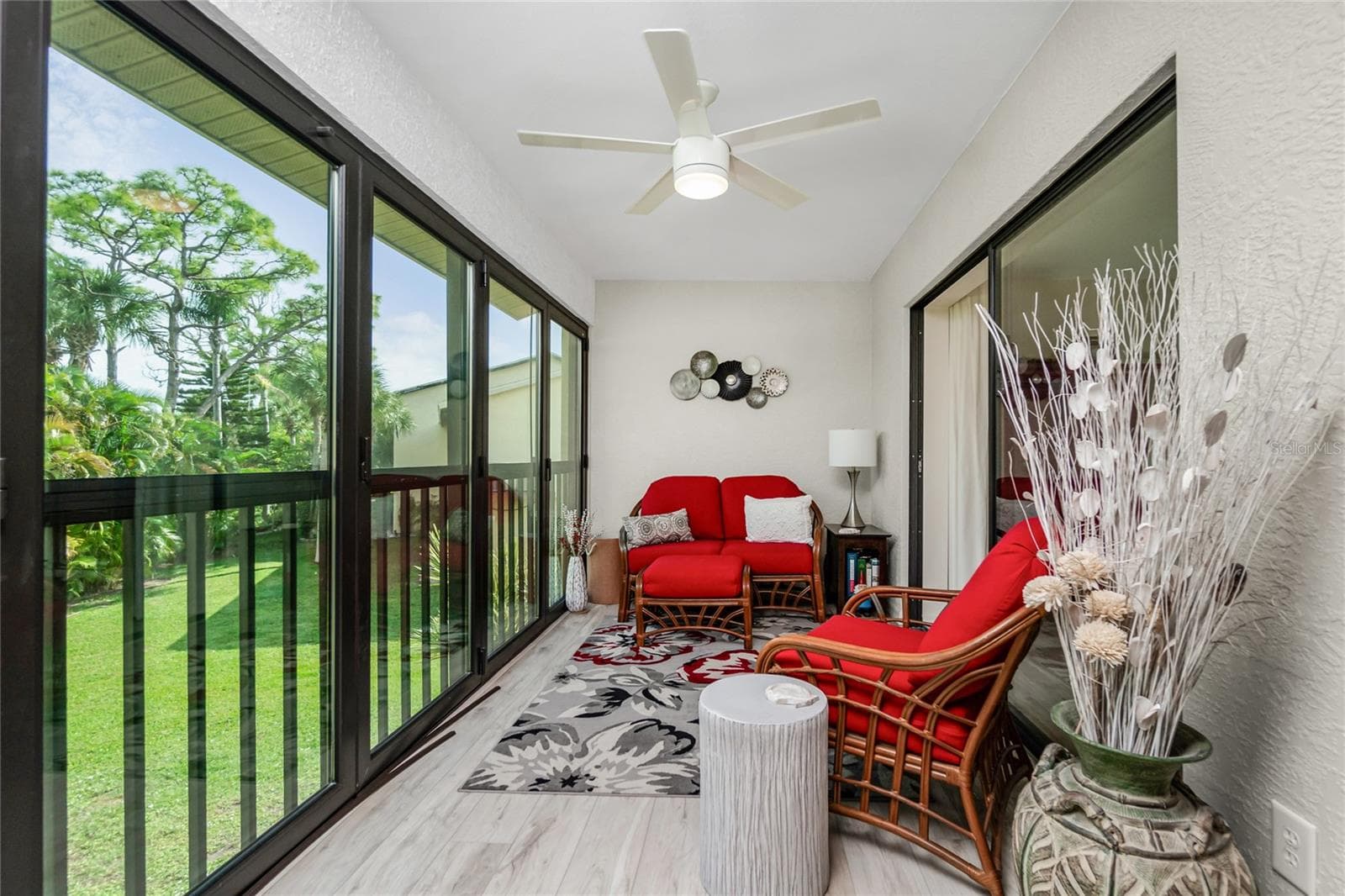 Florida room with Impact sliding glass doors - 4260 PLACIDA RD #9D, ENGLEWOOD