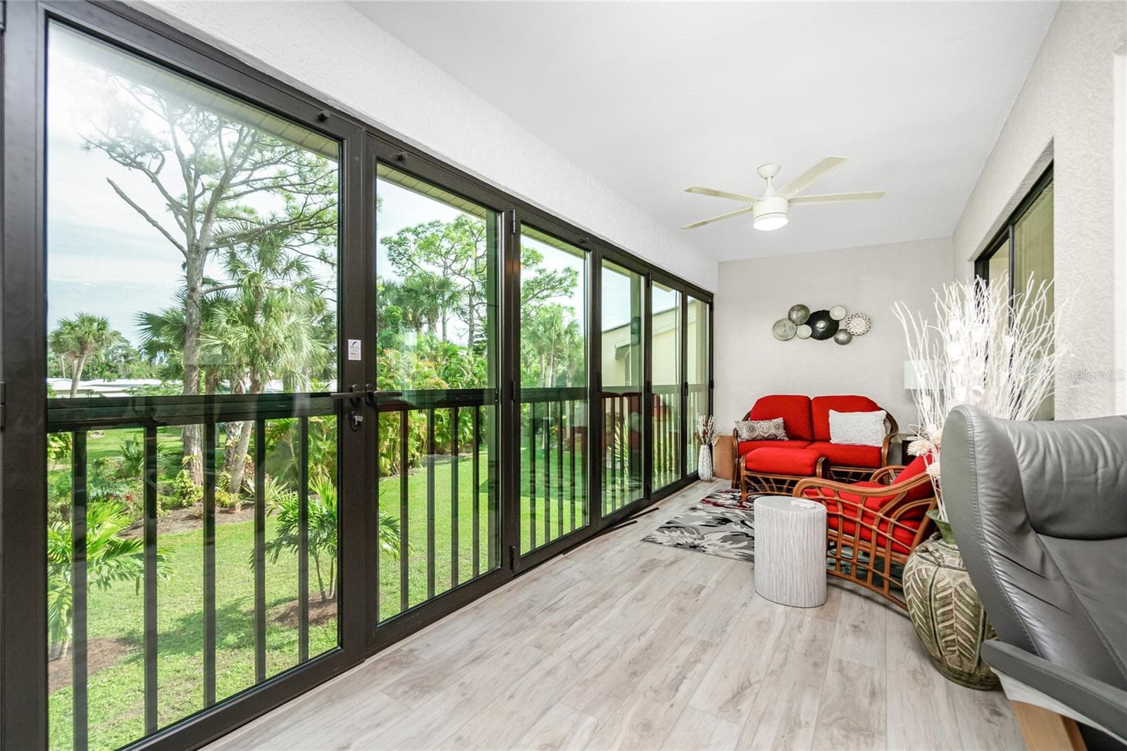 Florida room with Impact sliding glass doors - 4260 PLACIDA RD #9D, ENGLEWOOD