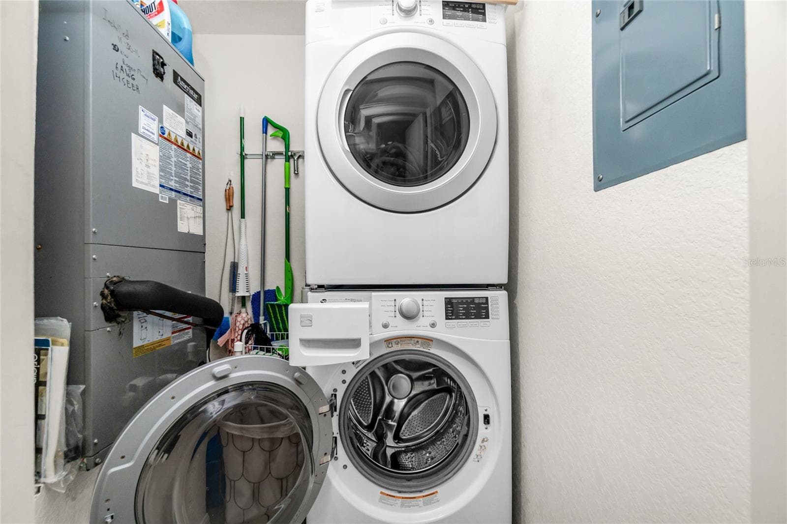 Laundry closet with stack washer/dryer - 4260 PLACIDA RD #9D, ENGLEWOOD
