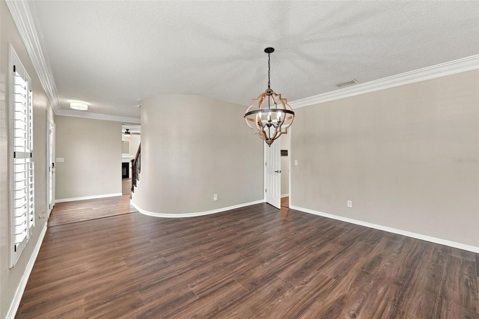 Dining room with Brand New LVP Flooring and plantation shutters - 1349 VALLEY PINE CIR, APOPKA