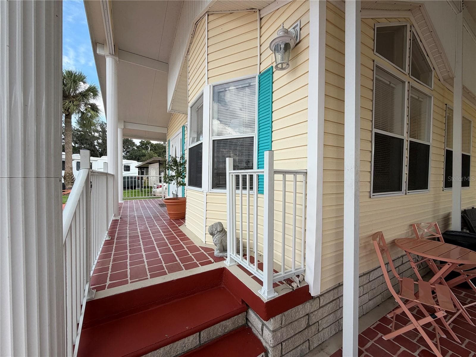 Front porch from carport - 35248 TIFFANI CT #Lot 064, ZEPHYRHILLS