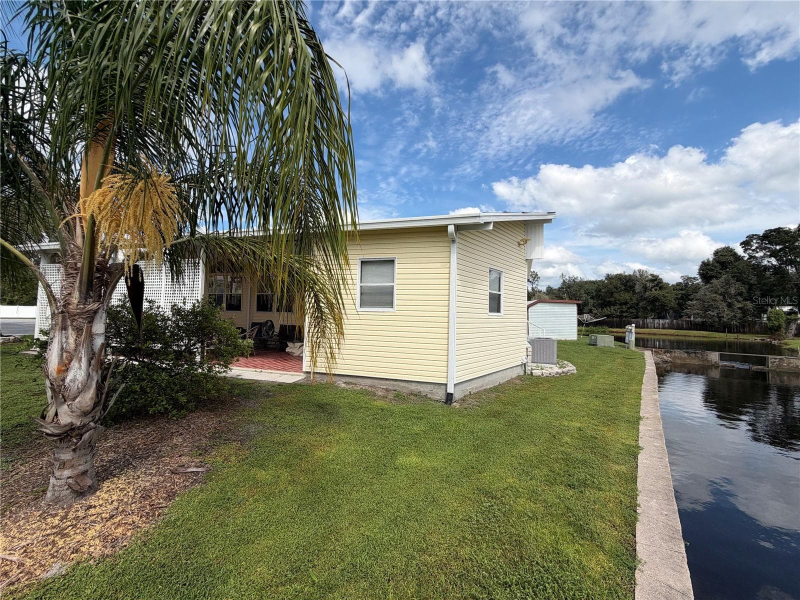 Water view from north - 35248 TIFFANI CT #Lot 064, ZEPHYRHILLS