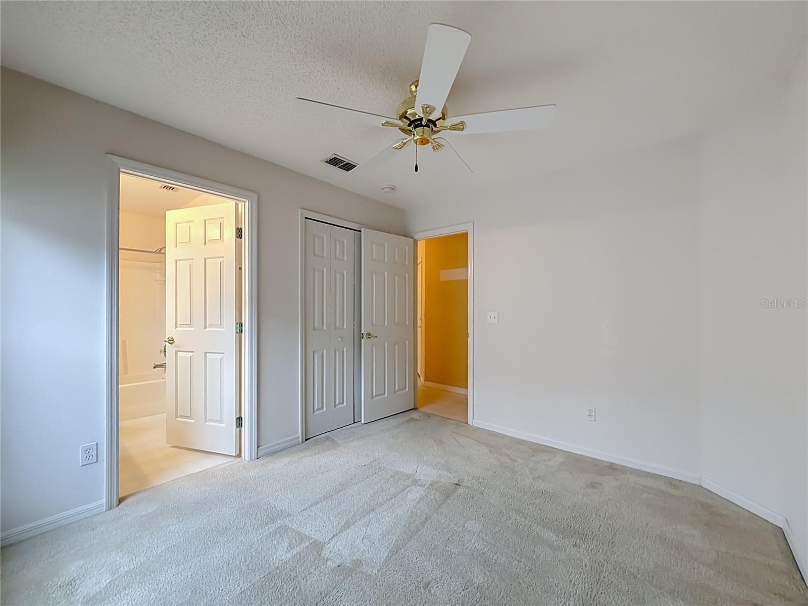 Bedroom 2 with entry to second full bath - 2038 BRAXTON ST, CLERMONT