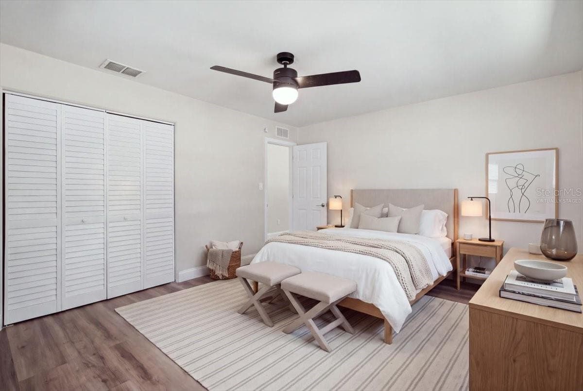 Virtually Staged Primary Bedroom - 1837 PASADENA DR, DUNEDIN
