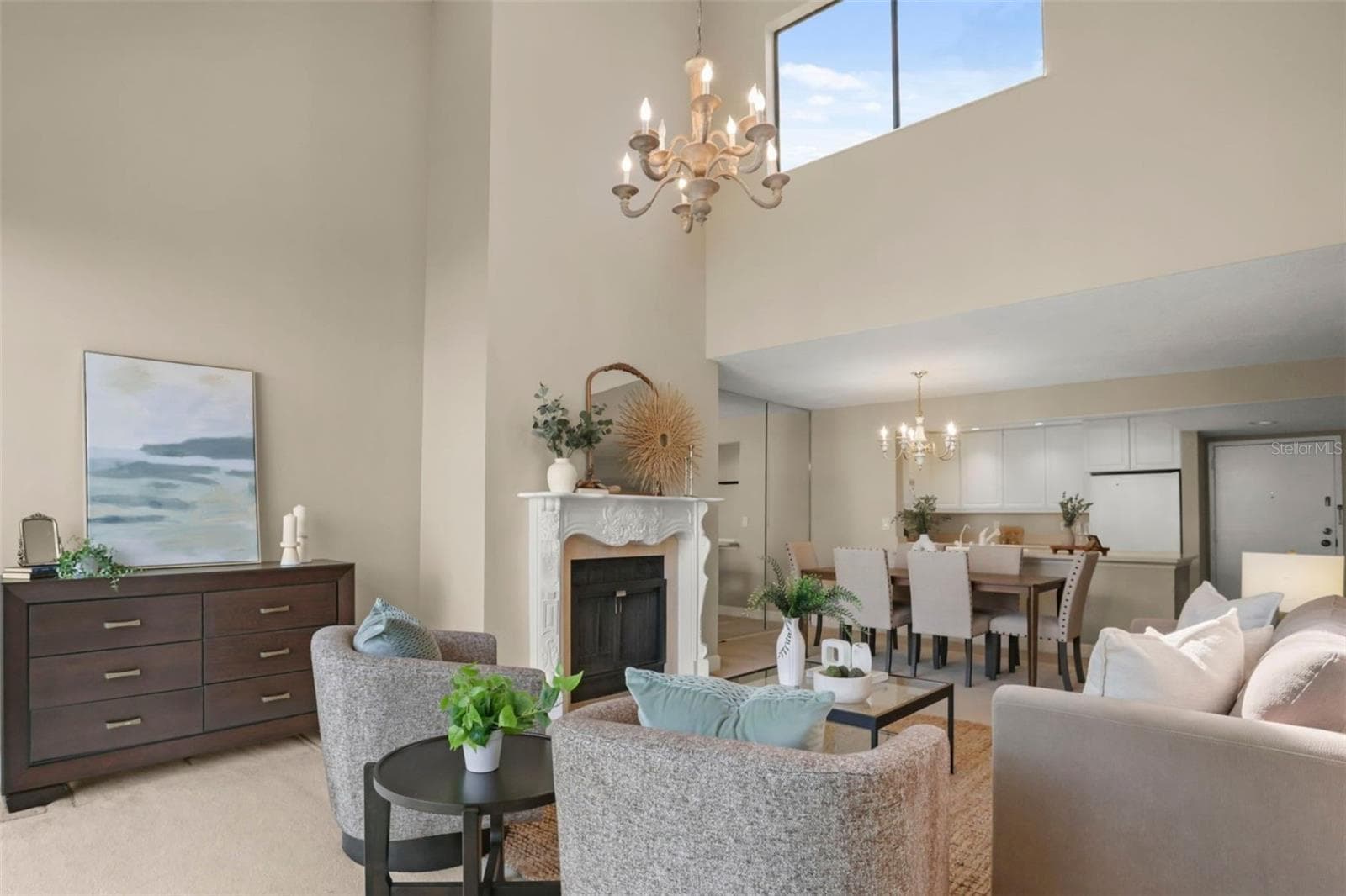 Great sightlines from the living room, dining room, and kitchen create an open feel that is ideal for entertaining. - 300 CAROLINA AVE #402C, WINTER PARK