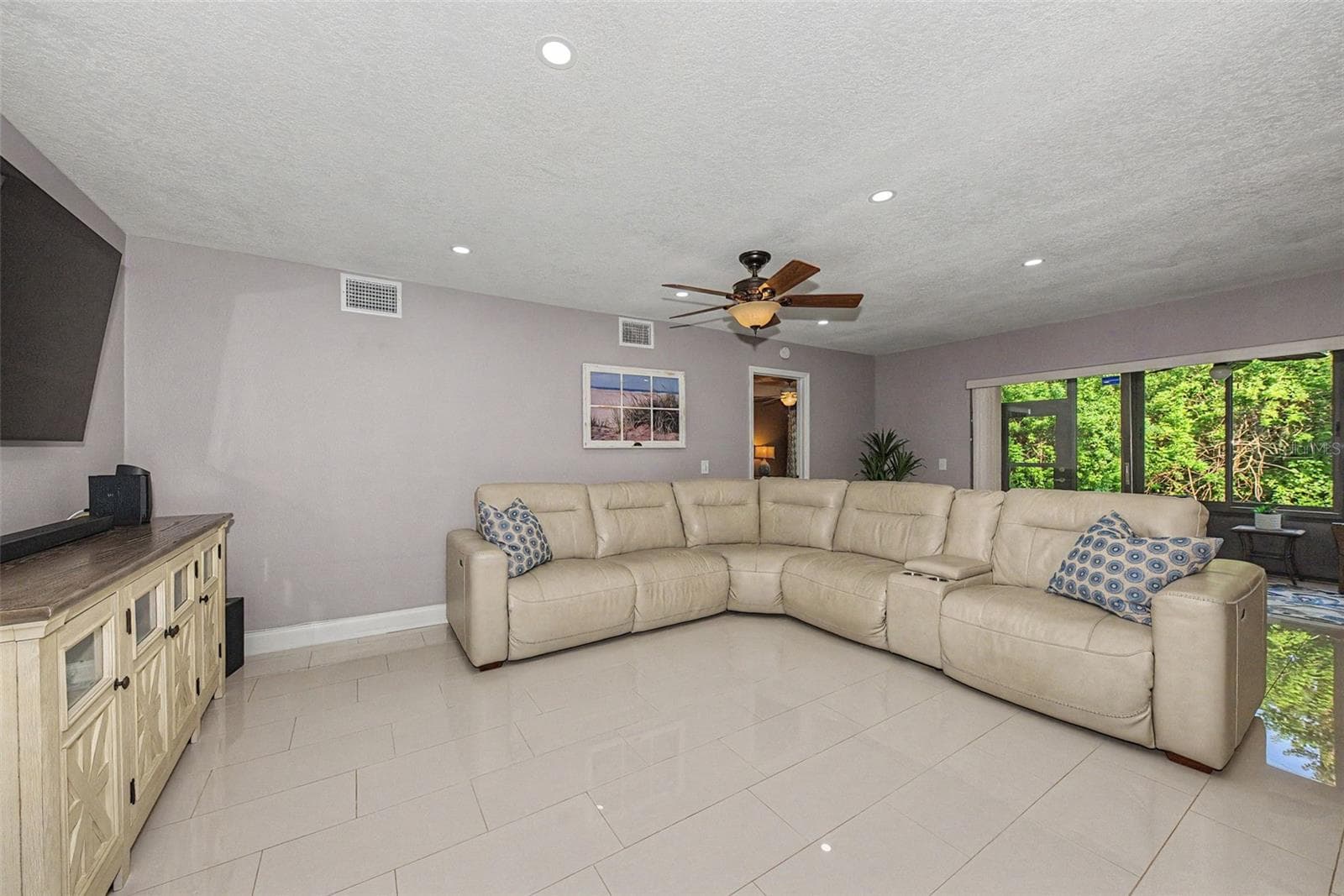 Living Room with porcelain tile - 1801 E LAKE RD #1D, PALM HARBOR