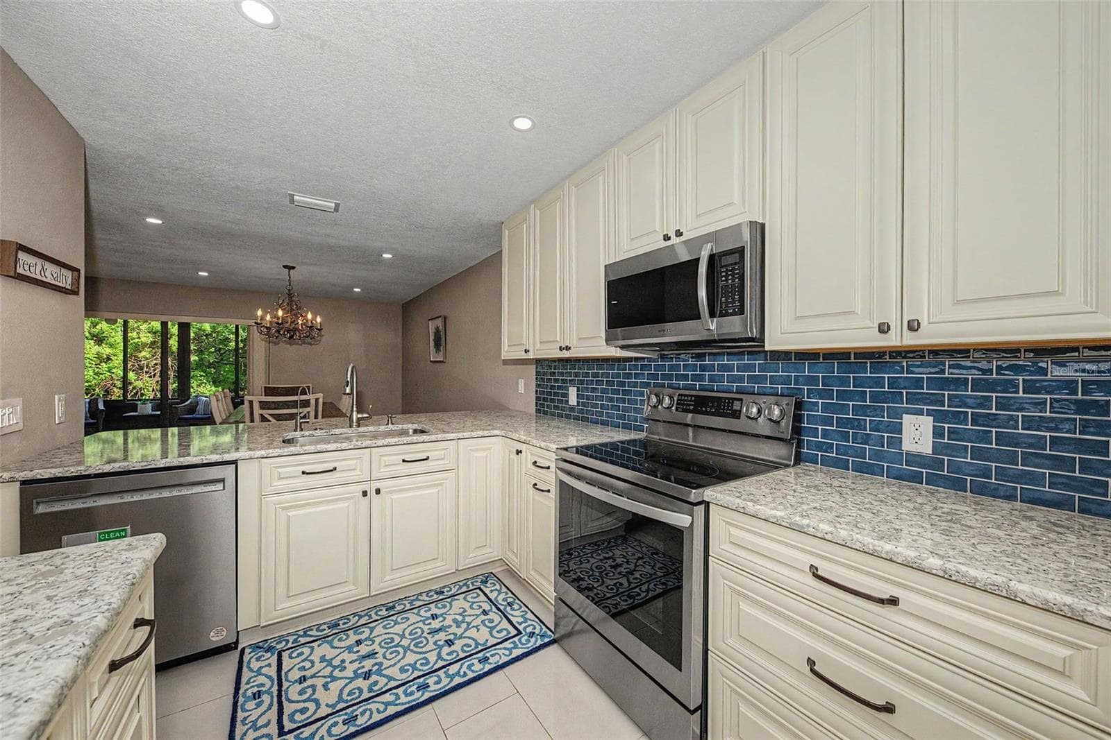 Kitchen w/reverse osmosis system - 1801 E LAKE RD #1D, PALM HARBOR