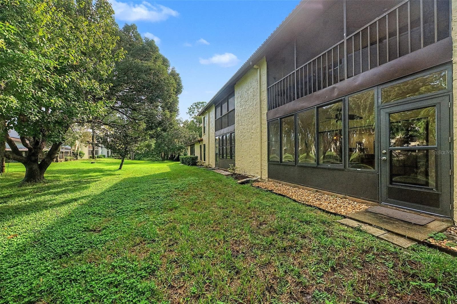 Back of condo - 1801 E LAKE RD #1D, PALM HARBOR