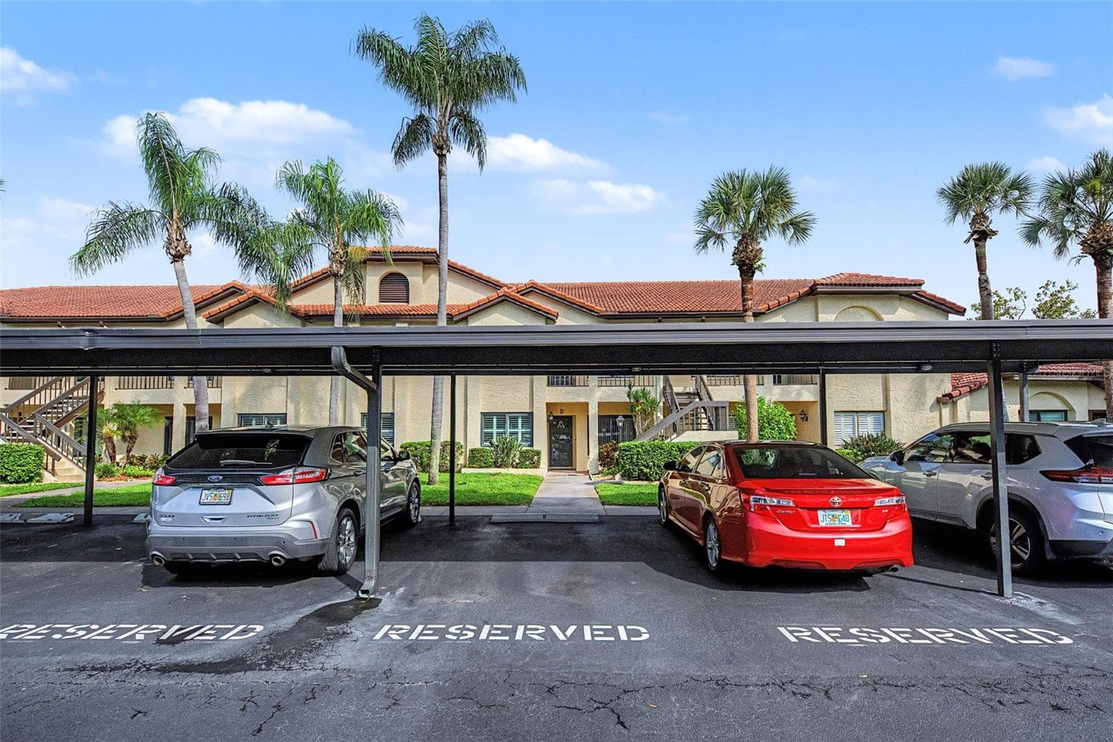 Reserved parking out front - 1801 E LAKE RD #1D, PALM HARBOR