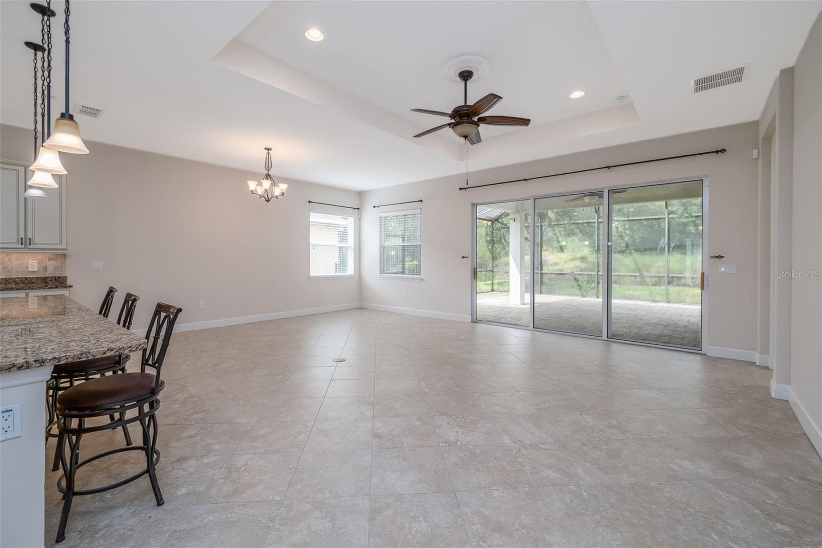 Great room / Dining room - 1076 GARDENSHIRE LN, DELAND