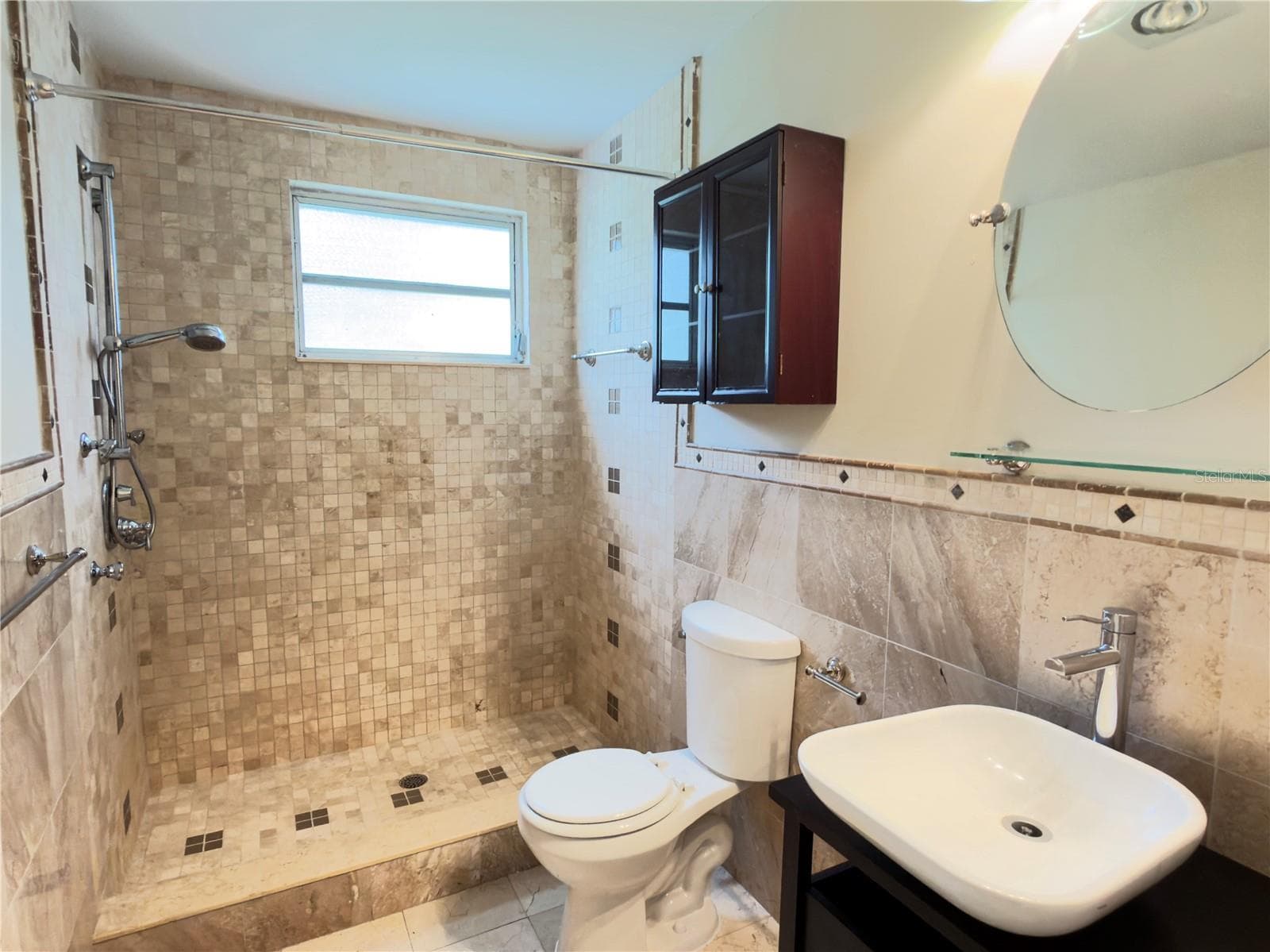 Walk in shower in the primary bath - 2378 ECUADORIAN WAY #22, CLEARWATER