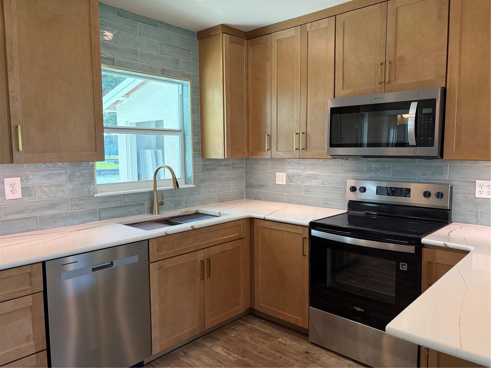 Updated kitchen with under cabinet lighting - 10451 MARION ST, ENGLEWOOD