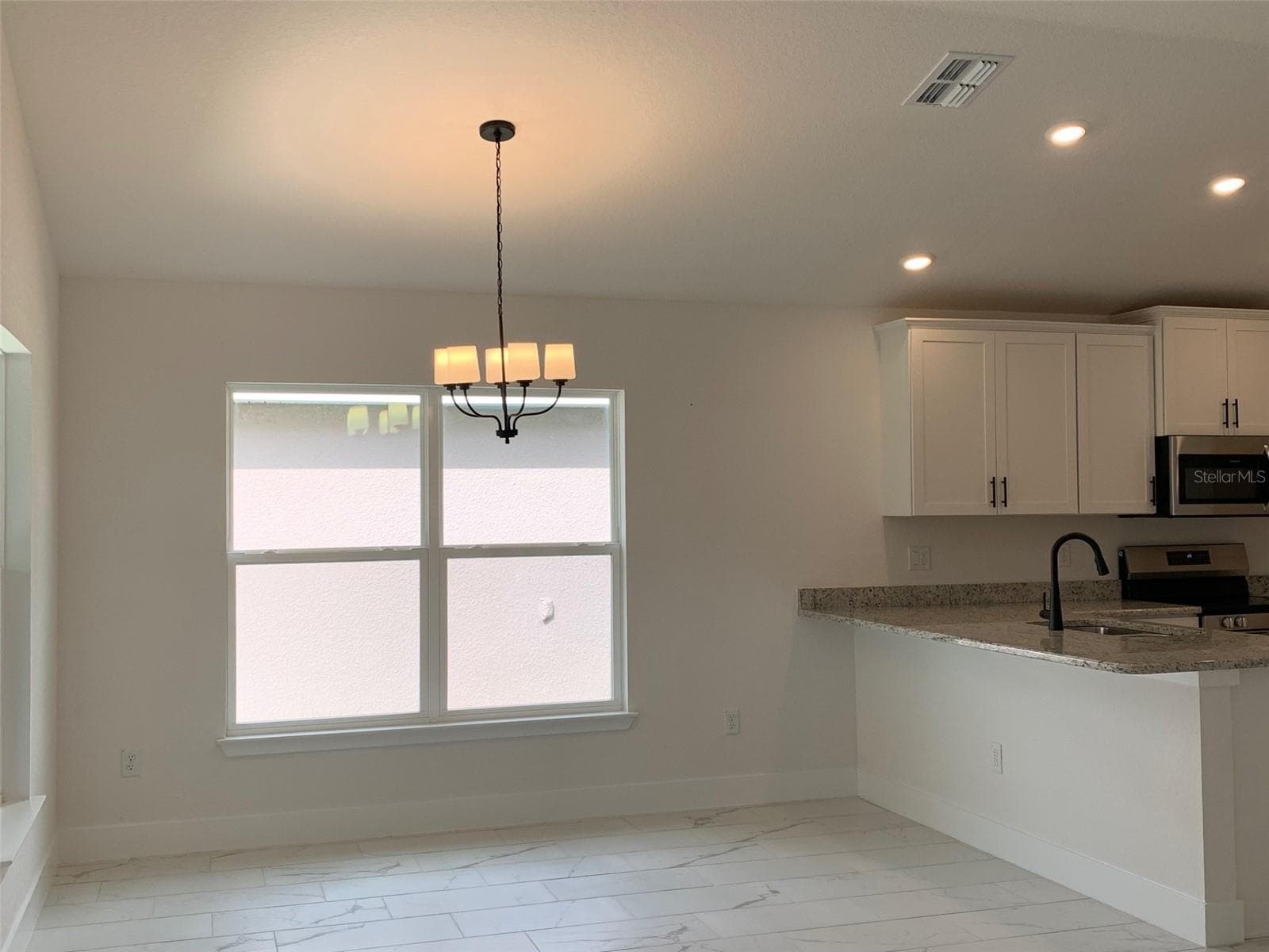 Dining area - 11603 GRACE RD, WEEKI WACHEE