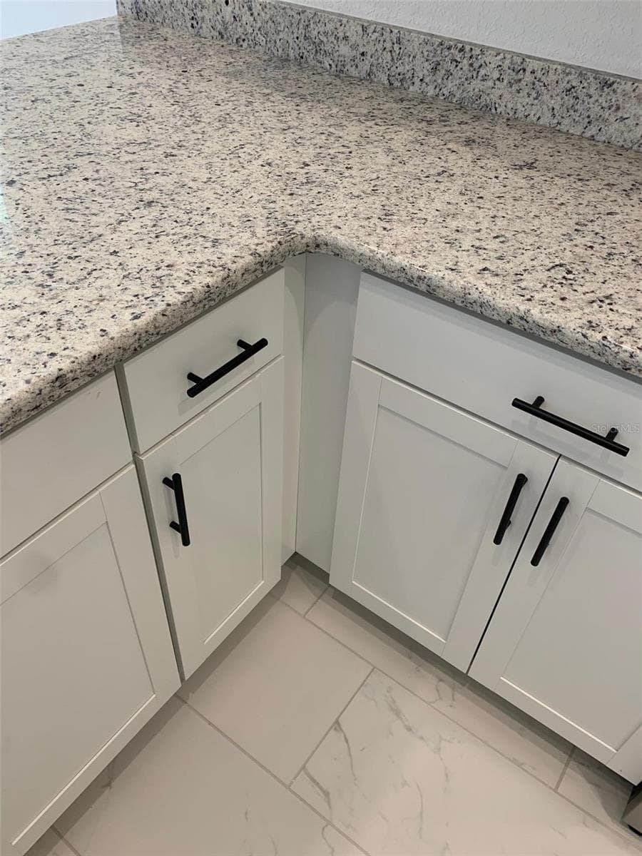 Cabinets/countertops/flooring - 11603 GRACE RD, WEEKI WACHEE