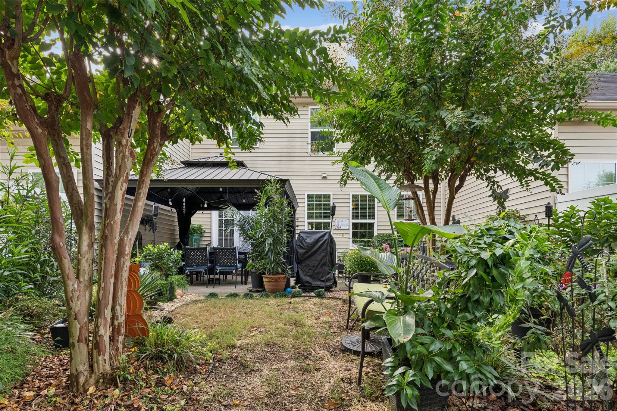 End of back yard looking back toward home and gazebo - 9506 Birkwood Court, Charlotte