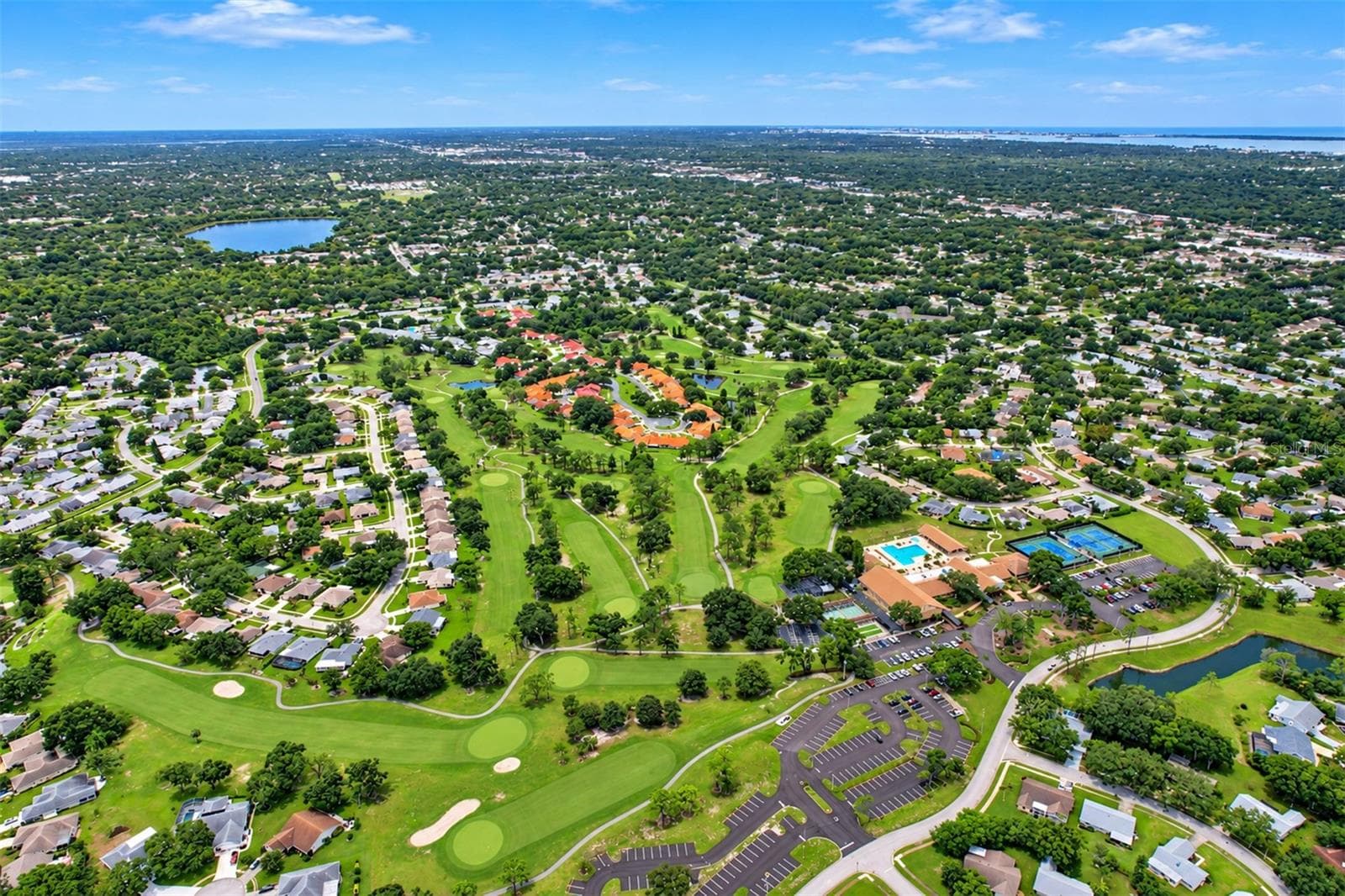Aerial view of the lush golf course(s) - 978 MADRID DR, PALM HARBOR