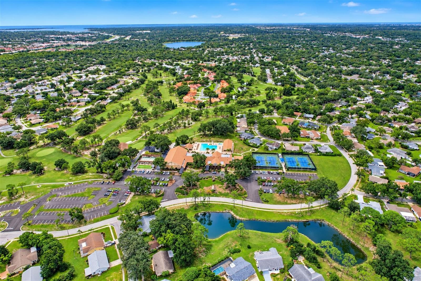 More aerial views of the Highland Lakes facilities and grounds - 978 MADRID DR, PALM HARBOR