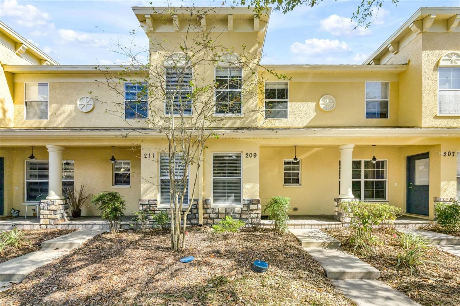 FRONT EVEVATION - 209 DRAW BRIDGE LN, VALRICO