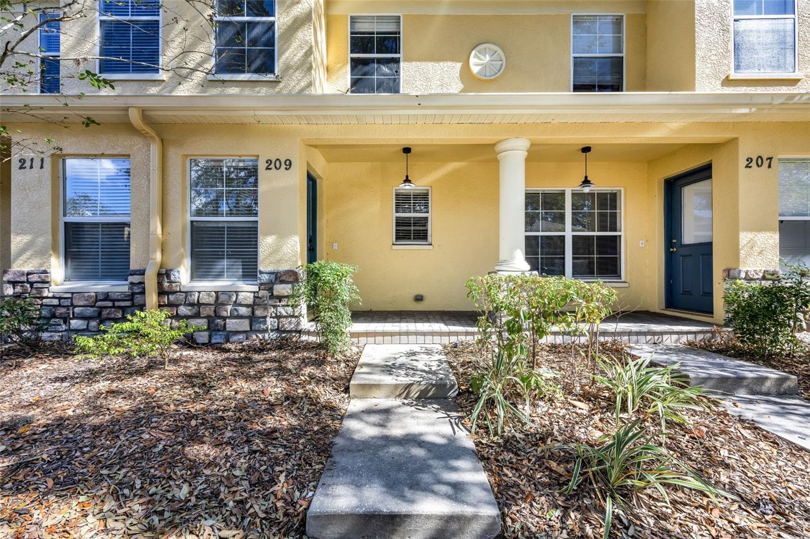 FRONT EVEVATION - 209 DRAW BRIDGE LN, VALRICO
