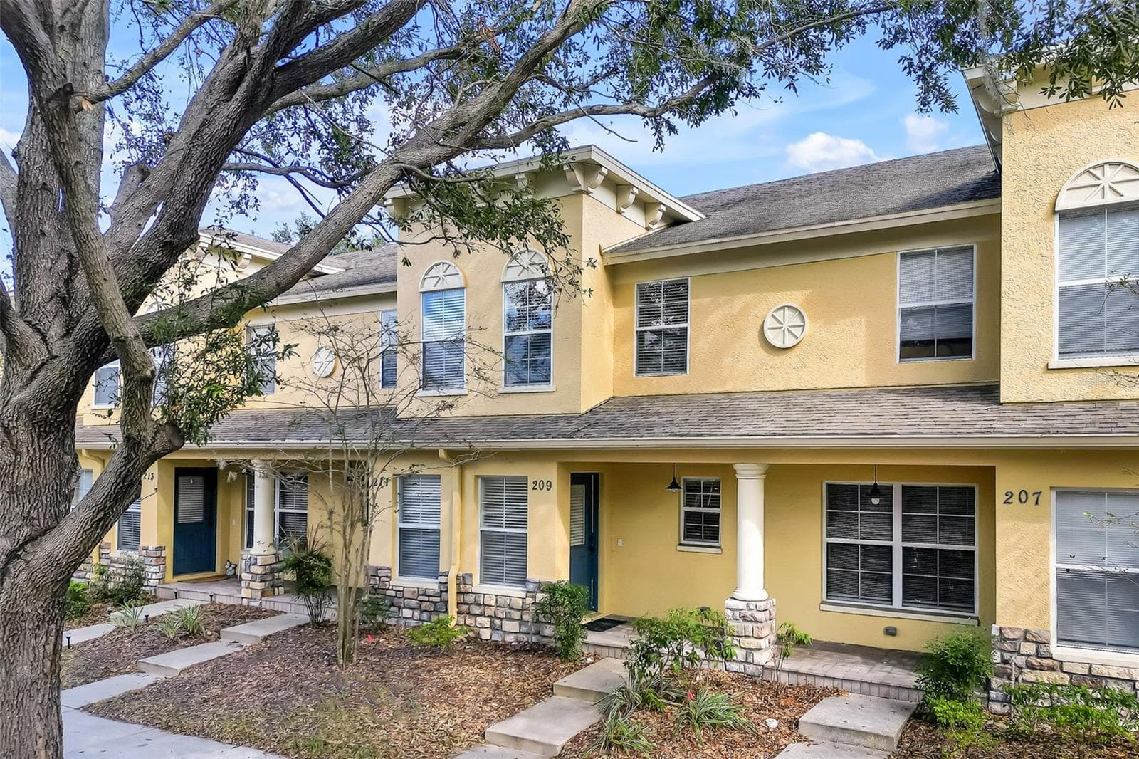 FRONT ELEVATION - 209 DRAW BRIDGE LN, VALRICO