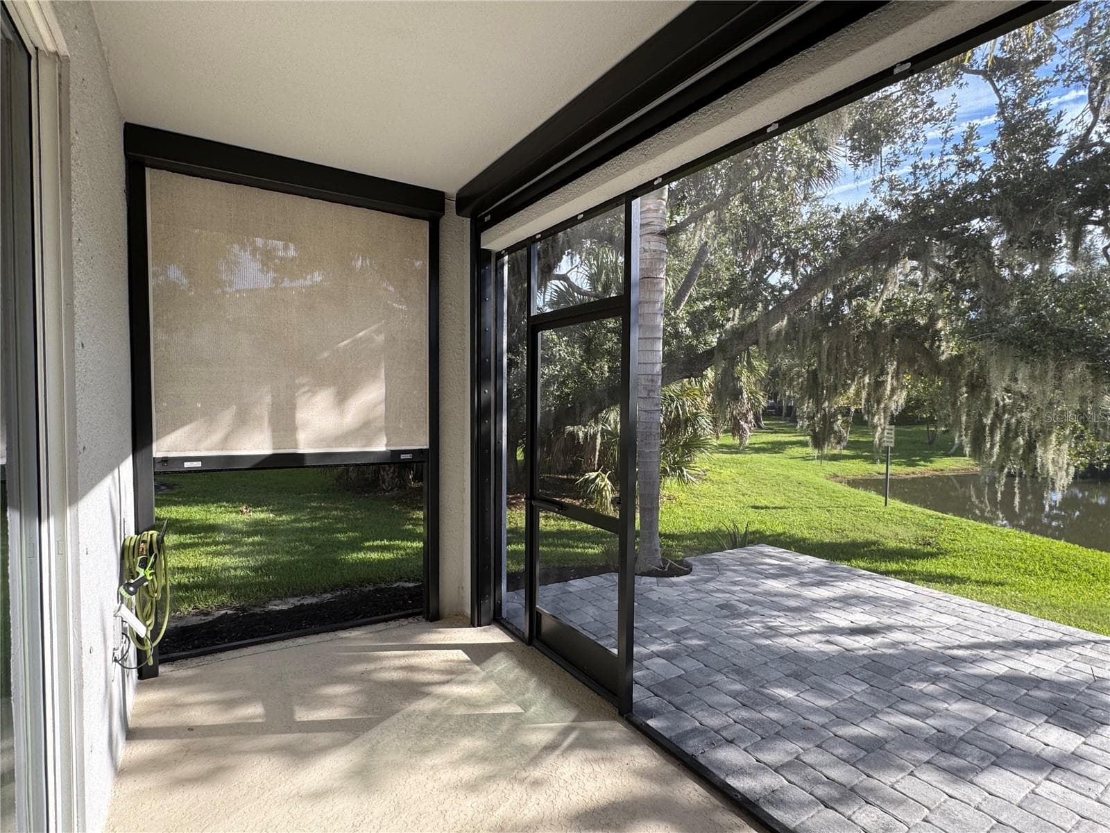 Electric hurricane screens - 8696 ICE WINE ST, SARASOTA