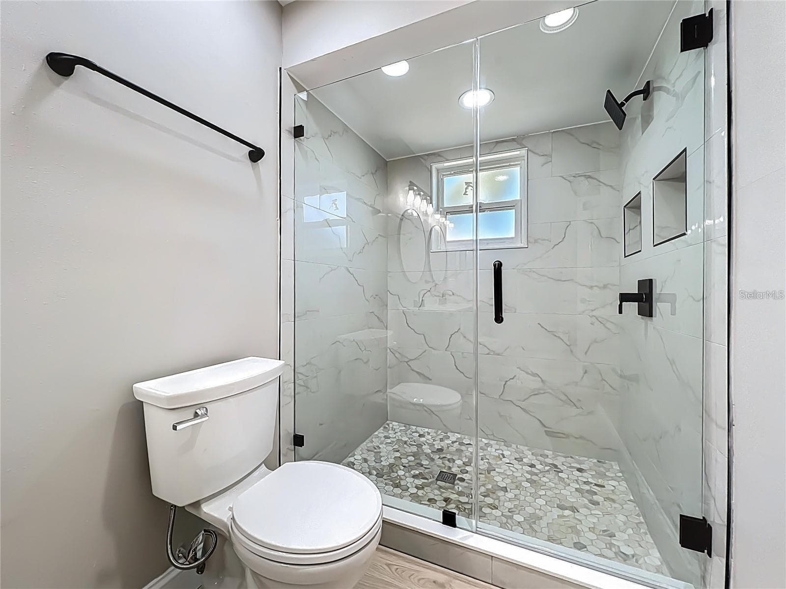 View of primary bathroom, shower. - 6911 CRESCENT RIDGE RD, ORLANDO