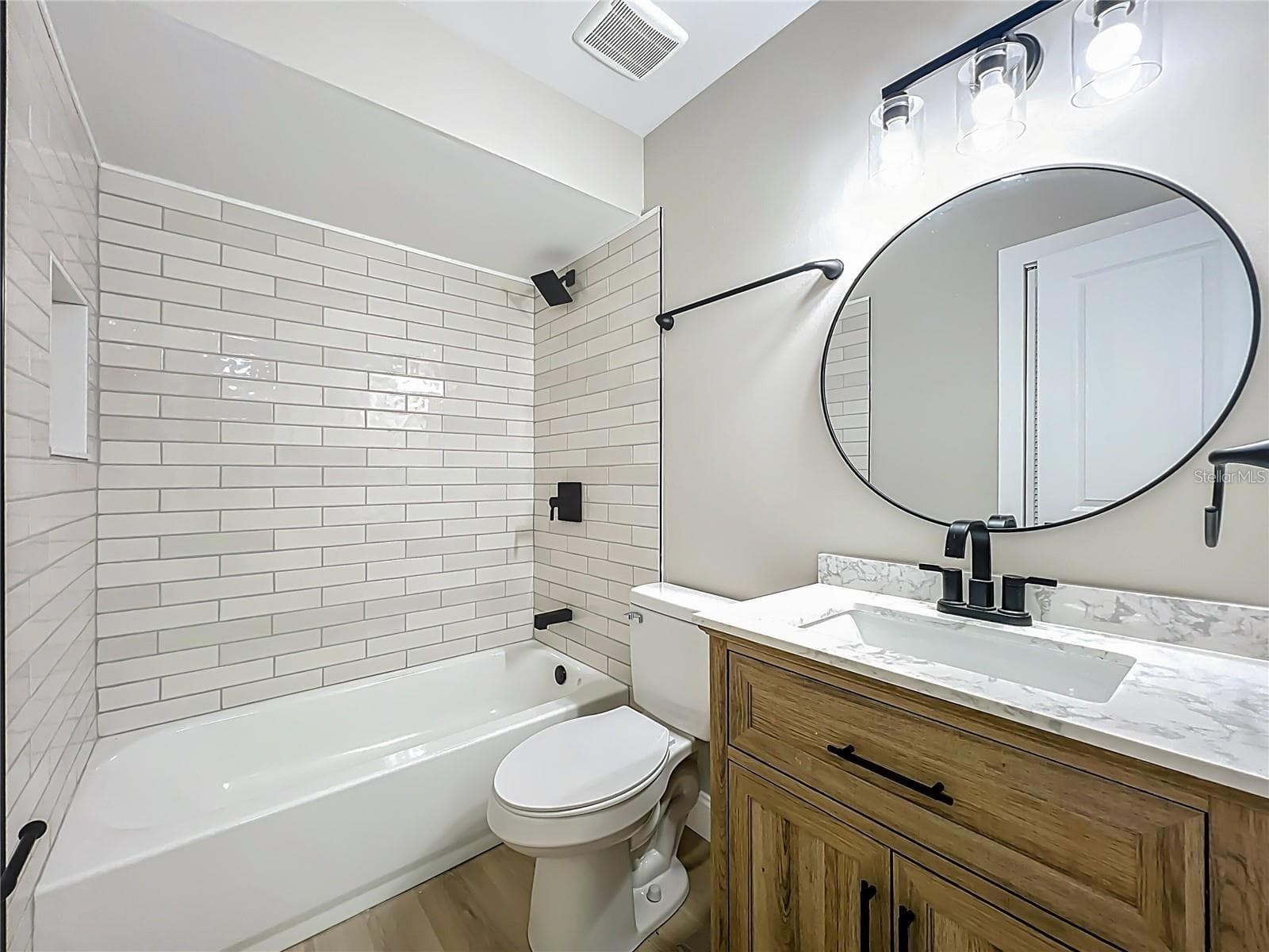 View of remodeled guest bathroom. - 6911 CRESCENT RIDGE RD, ORLANDO