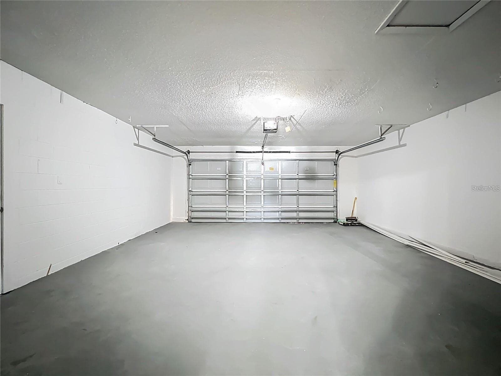 View of garage. - 6911 CRESCENT RIDGE RD, ORLANDO