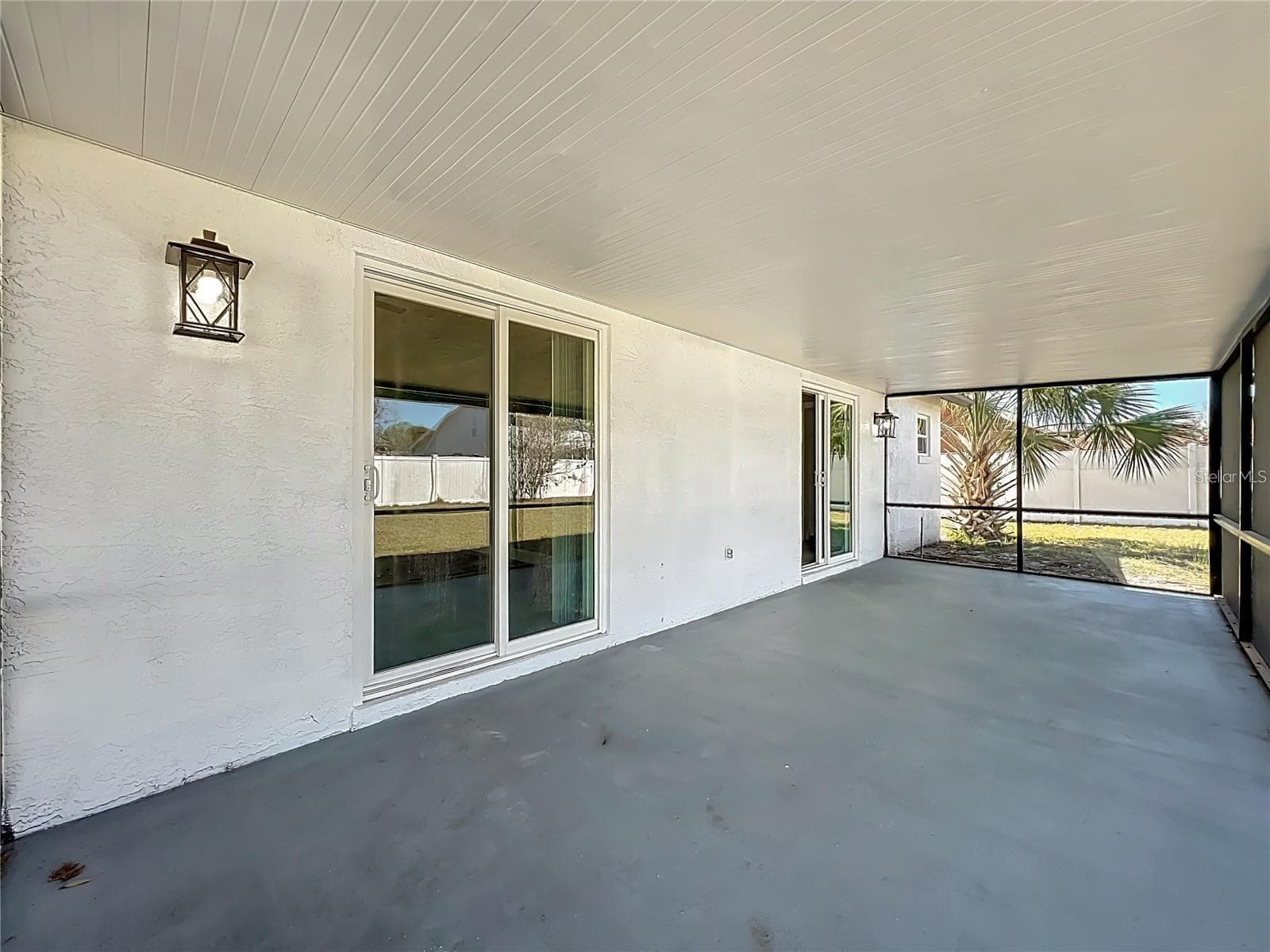 View of sliding doors, screened in patio. - 6911 CRESCENT RIDGE RD, ORLANDO