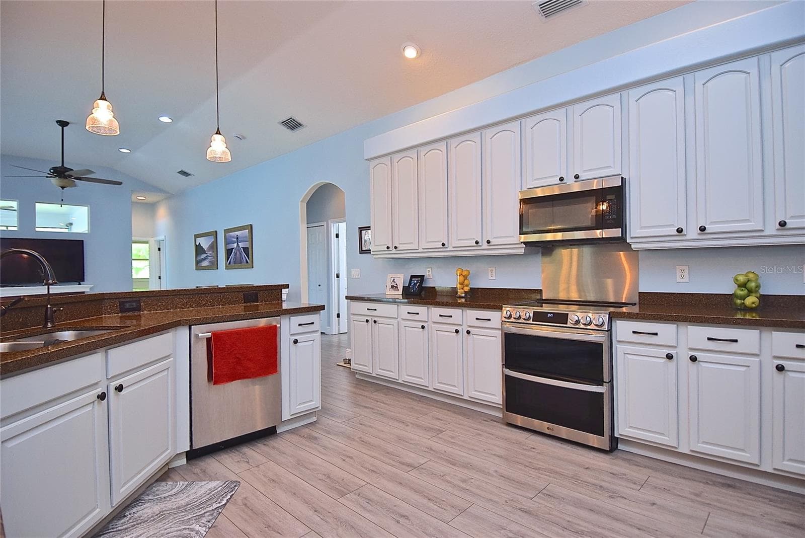 Kitchen and island - 8309 MISTY LAKE CIR, SARASOTA