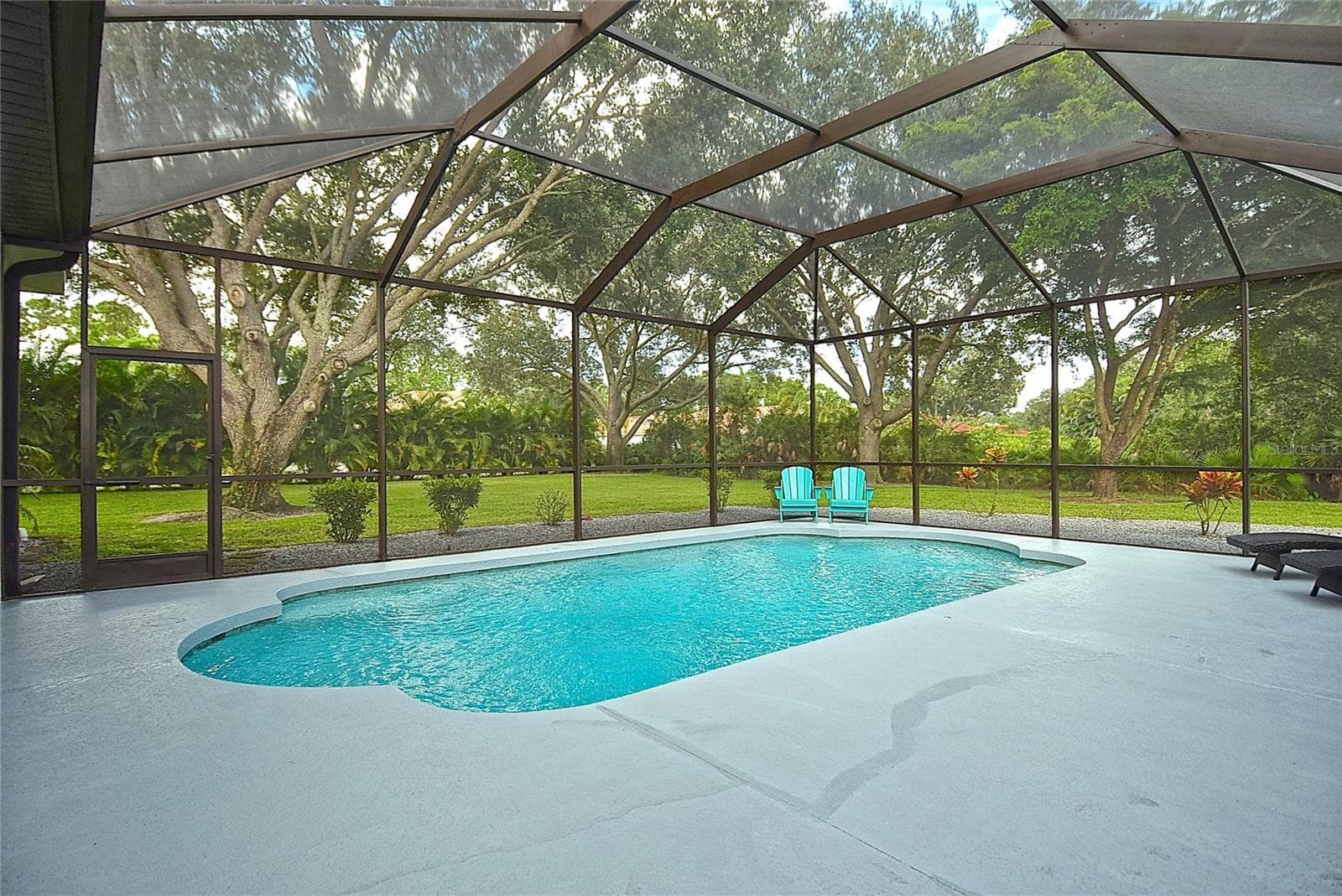 Pool and screened enclosure - 8309 MISTY LAKE CIR, SARASOTA