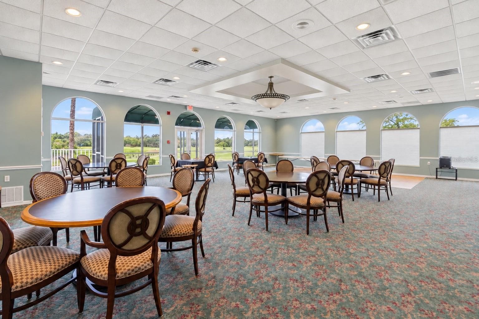 Clubhouse main dining room, digitally edited chandelier lighting - 8309 MISTY LAKE CIR, SARASOTA