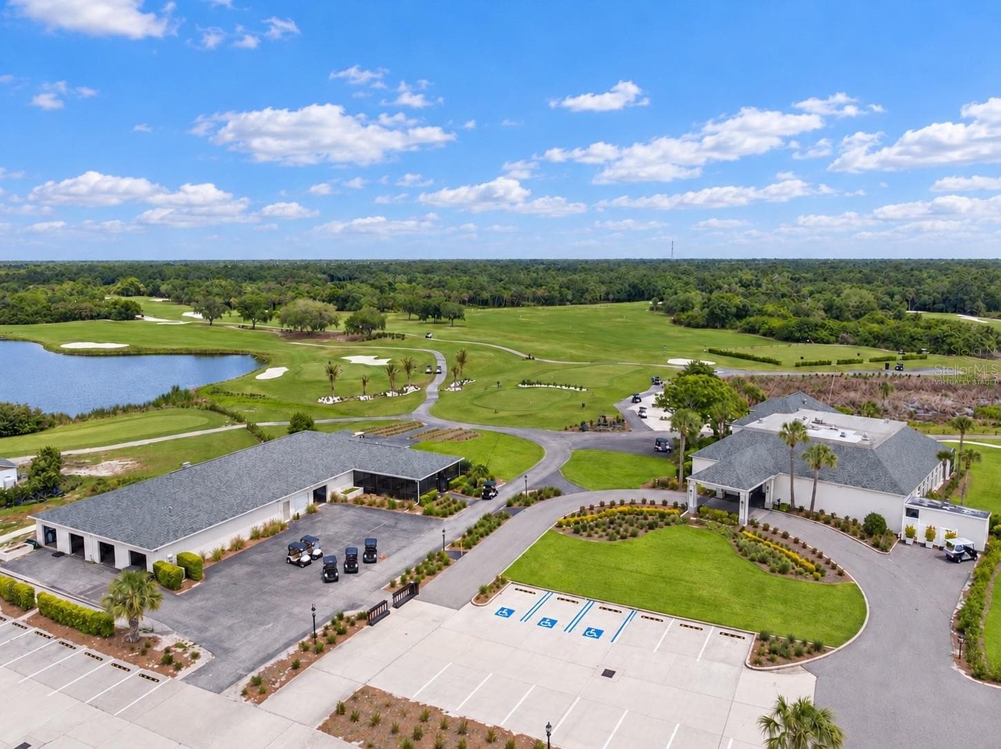 Clubhouse aerial, virtually staged, parked cars removed - 8309 MISTY LAKE CIR, SARASOTA