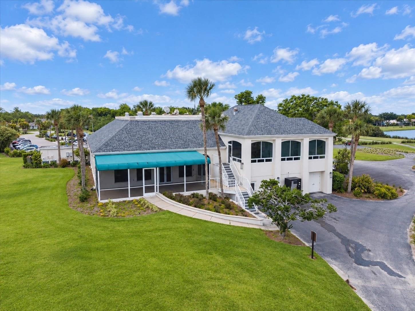 Clubhouse rear exterior - 8309 MISTY LAKE CIR, SARASOTA