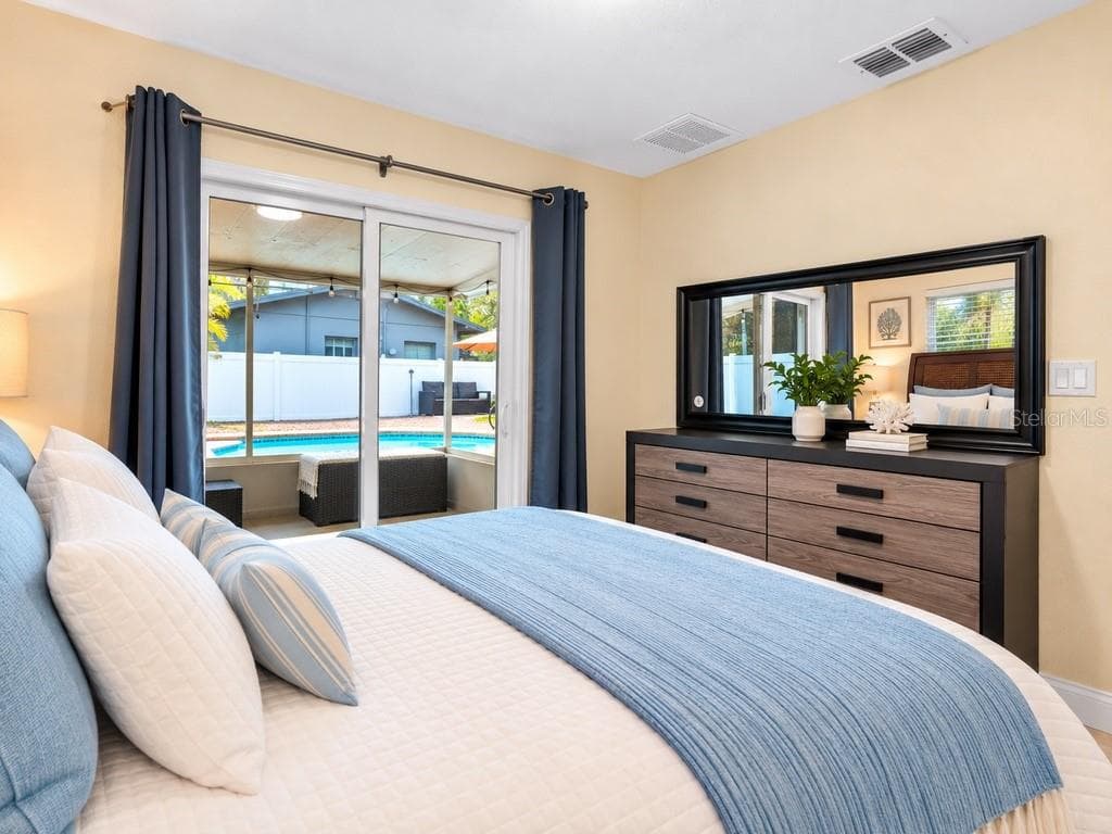 Bedroom 1 pool view - 2429 PARK ST N, ST PETERSBURG