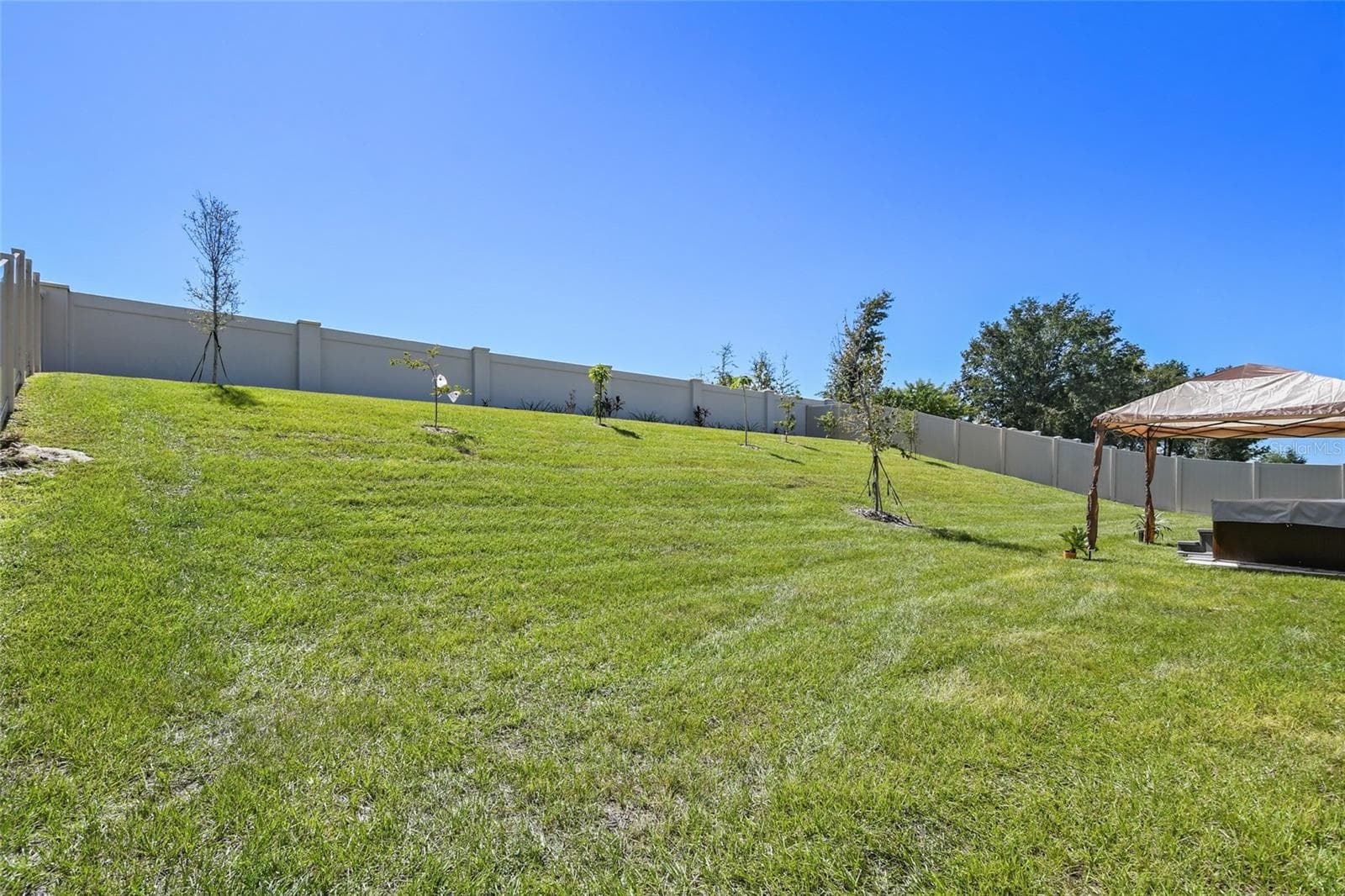 Fenced in backyard - 17922 HITHER HILLS CIR, WINTER GARDEN