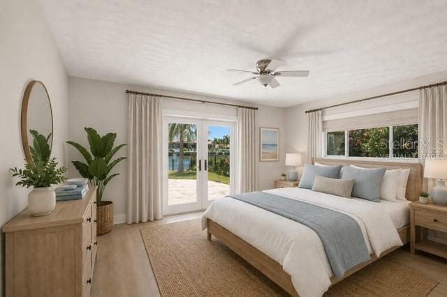 Virtually staged primary bedroom - 12525 4TH ST E, TREASURE ISLAND