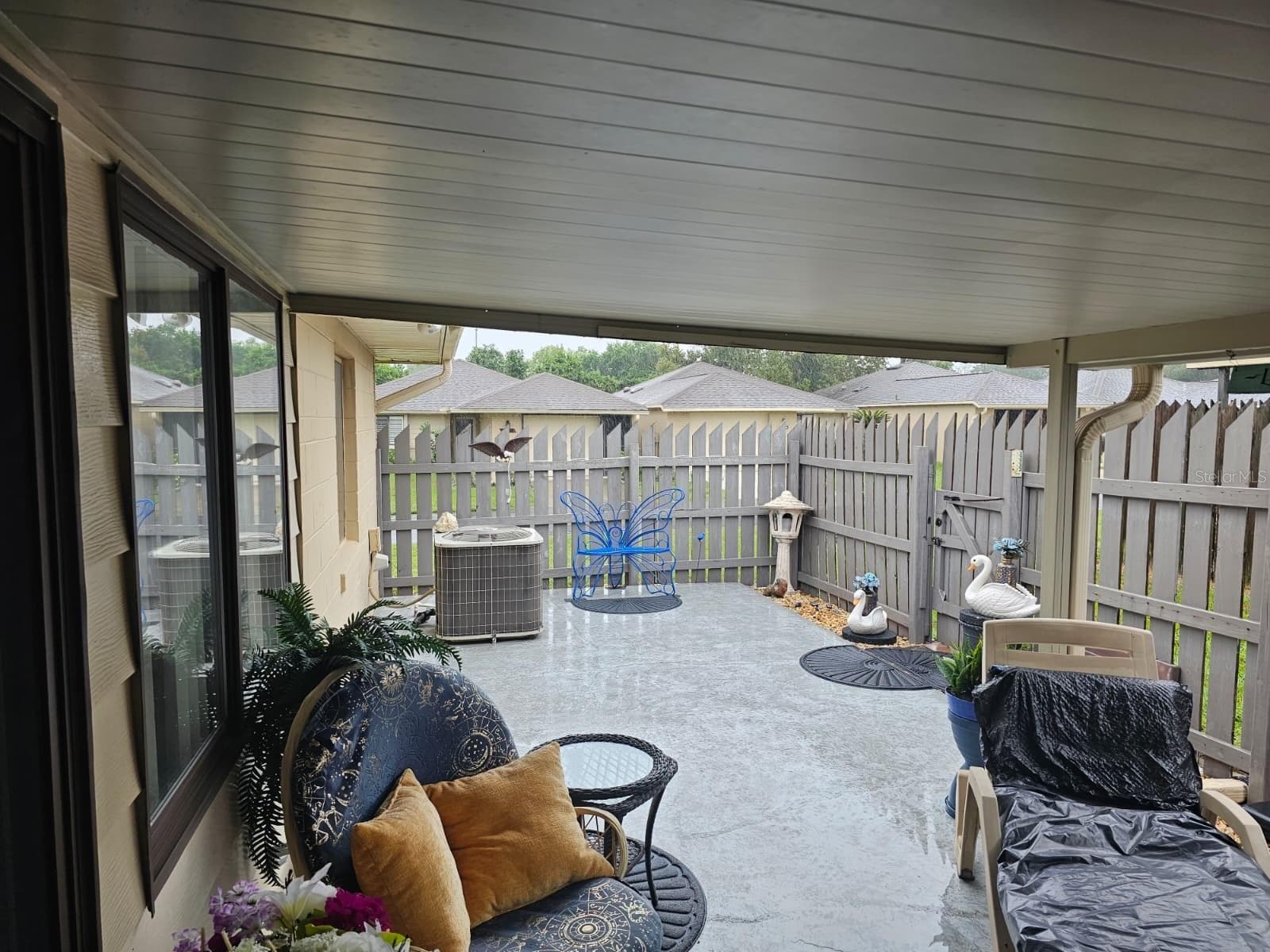 extended back patio - 5036 SE 107TH PL, BELLEVIEW