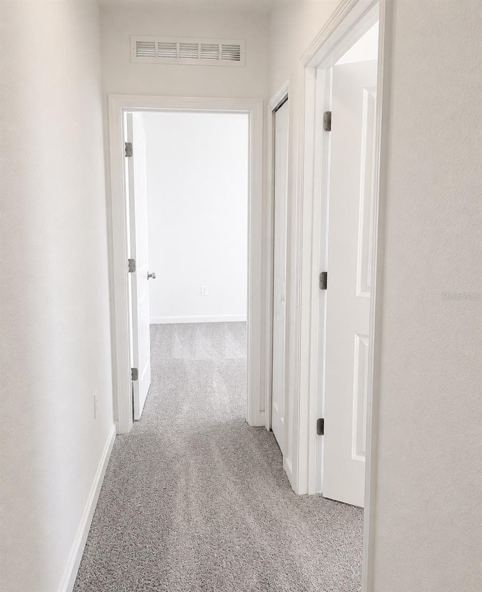 Upstairs Hallway - 409 BOGEY DR, DAVENPORT