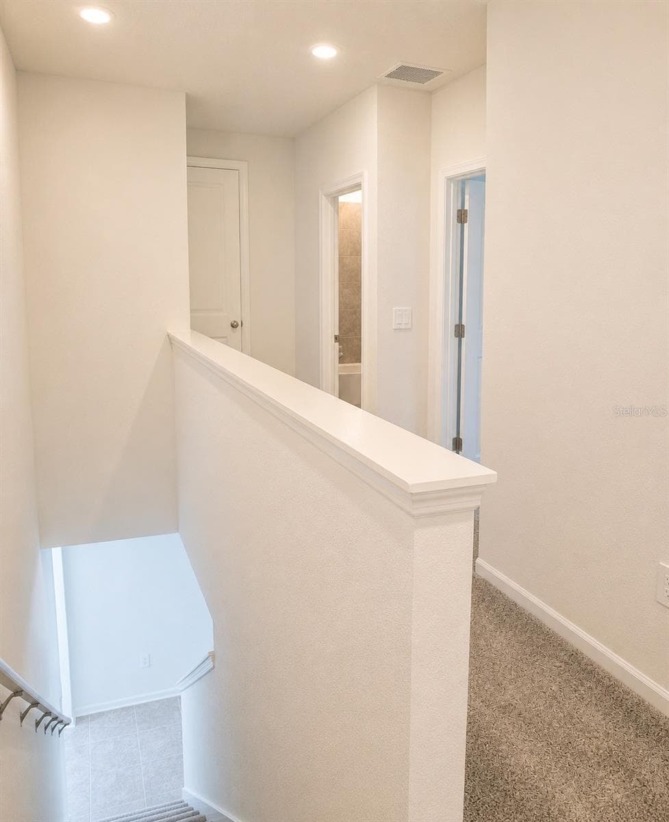 Upper Staircase View - 409 BOGEY DR, DAVENPORT