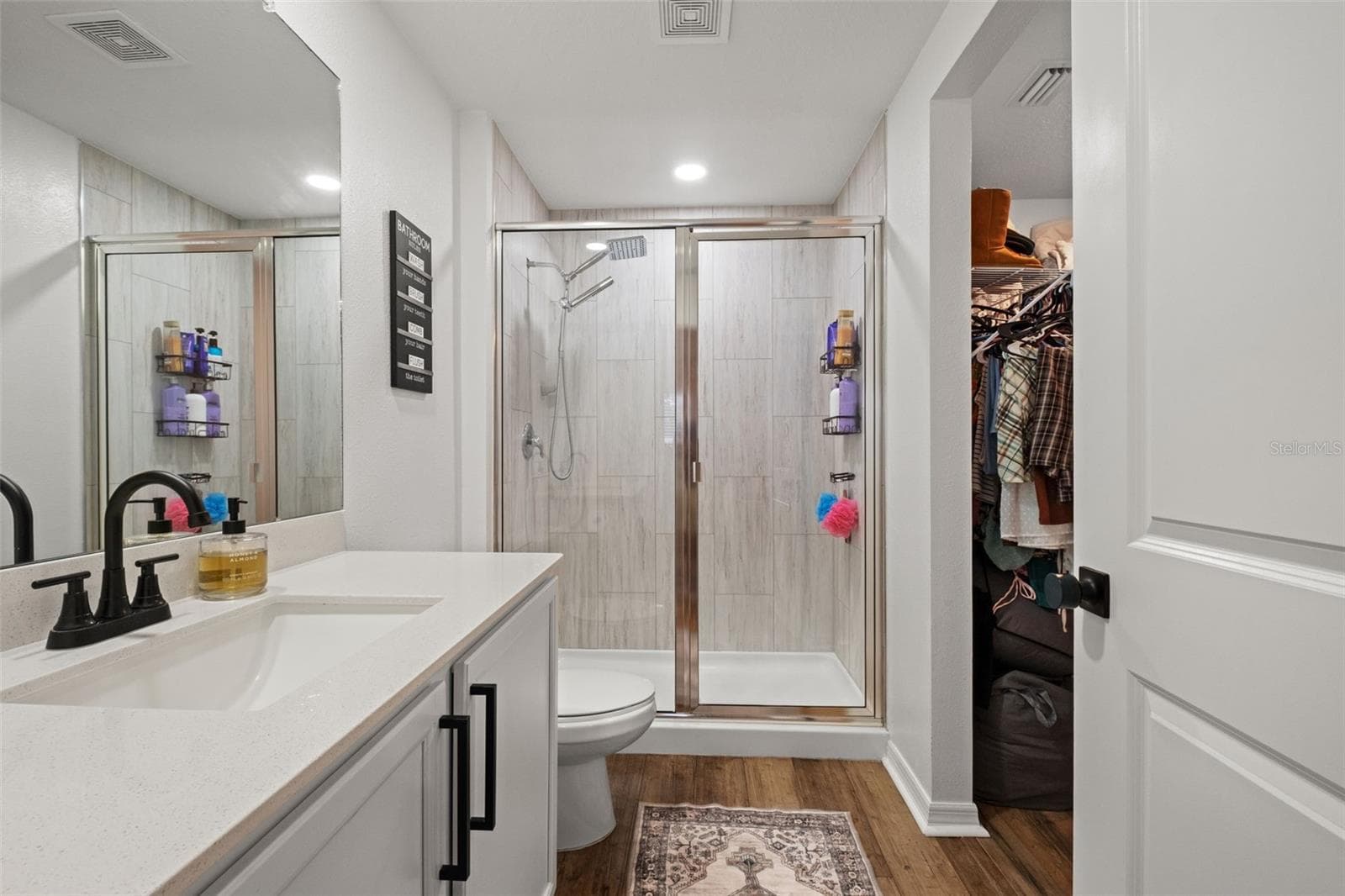 Primary bath/walk in closet - 13094 PAPERCRAFT AVE, WEEKI WACHEE