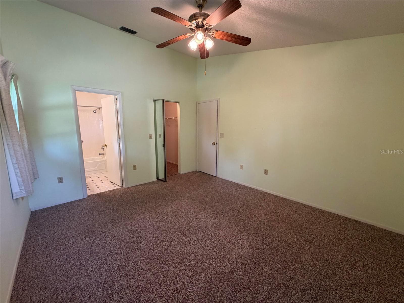 Primary bedroom with walk in closet. - 2904 OAK LN, BRADENTON