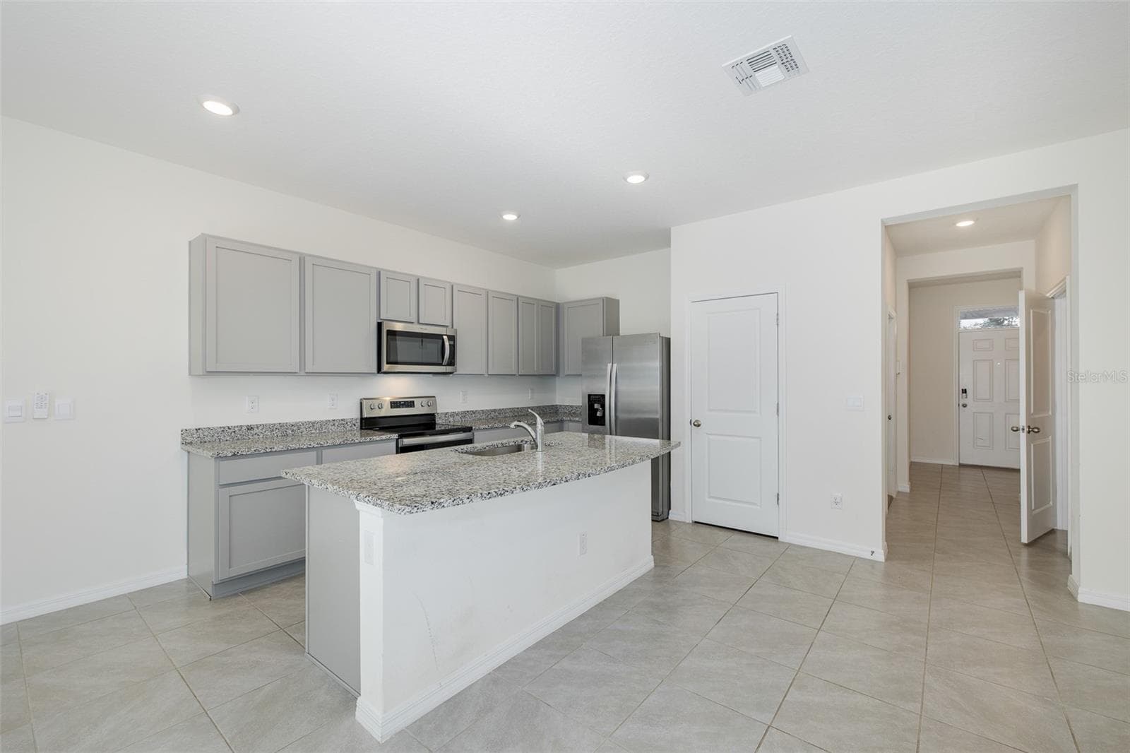 Large Kitchen with Walk In Pantry and Stainless Steel Appliances - 11166 CRESCENT DEER DR, LAND O LAKES